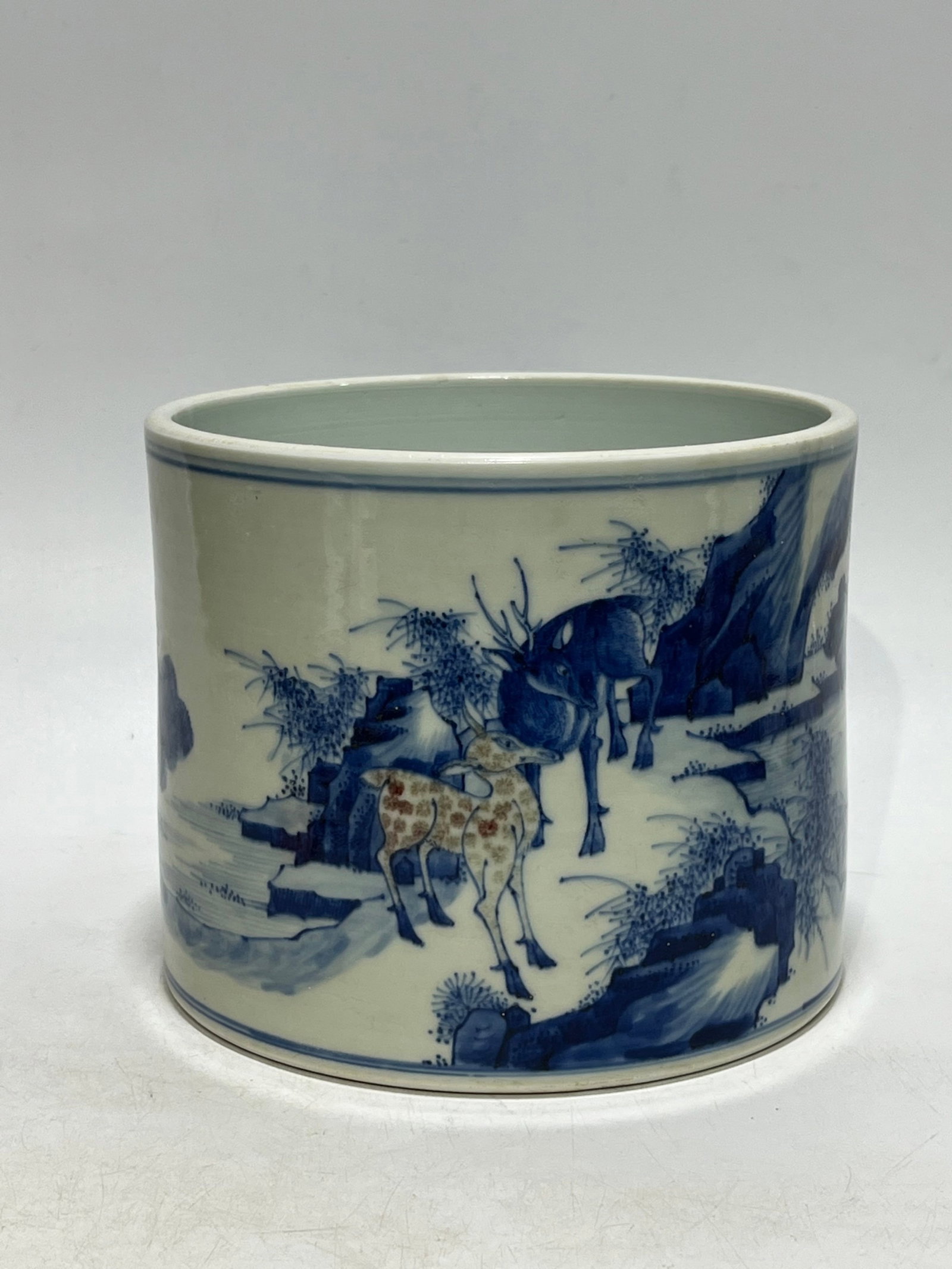An Exquisite Blue and White Underglaze-Red Pine,Deer and Crane Pattern Brush Pot: An Exquisite Blue and White Underglaze-Red Pine,Deer and Crane Pattern Brush Pot,Qing Dynasty,China,Size:7in 青花釉里红松鹿鹤纹笔筒,&#
