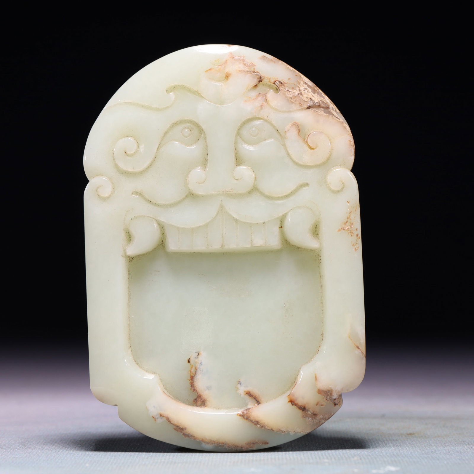 An Exquisite White Jade Beast-Face Pattern Ornament: An Exquisite White Jade Beast-Face Pattern Ornament,Qing Dynasty,China,Size:3.3inx5.1in,Weight:312g 白玉兽面纹摆件,中国清代