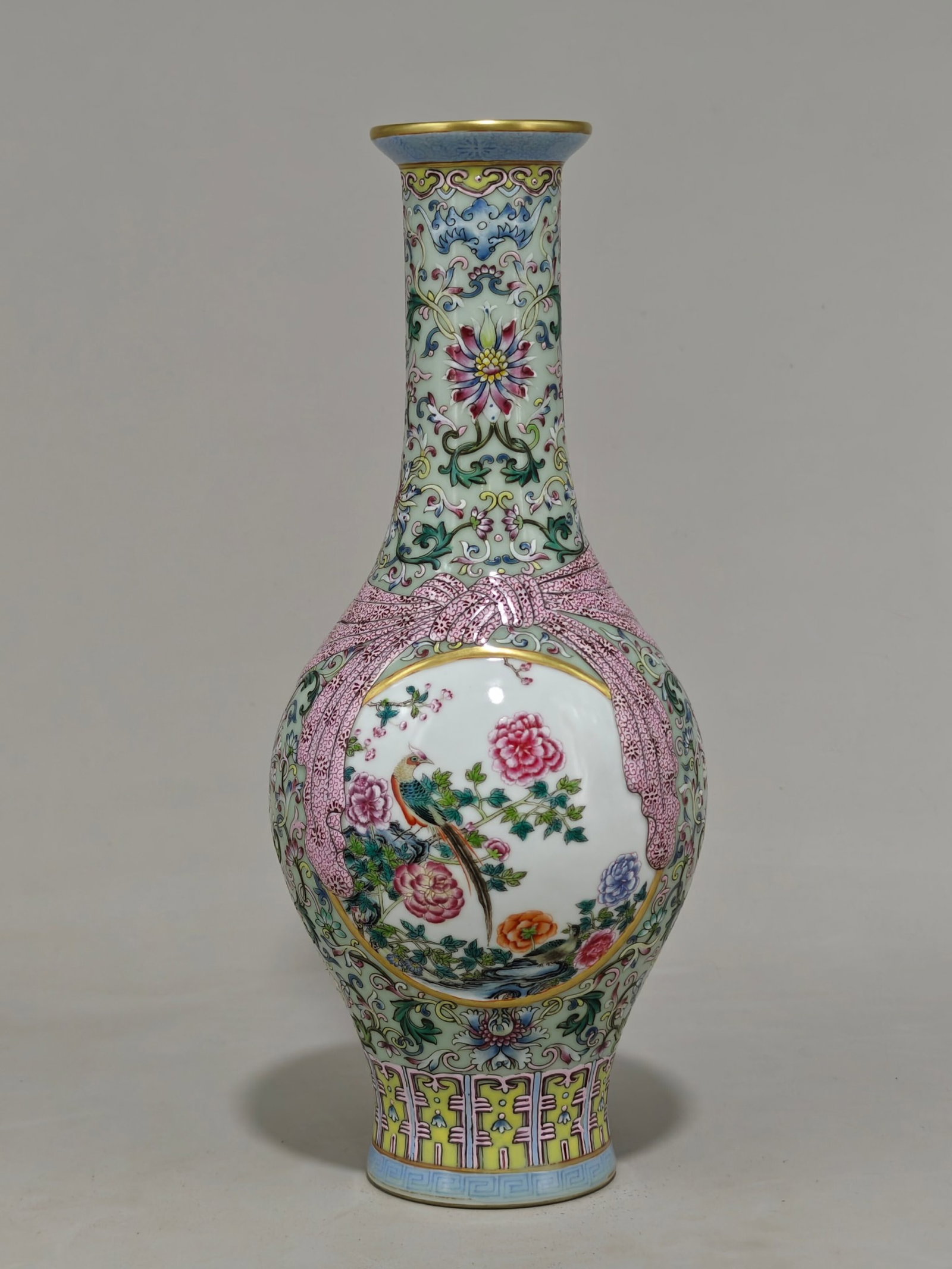 An Exquisite Celadon Glazed Flower Pattern Vase: An Exquisite Celadon Glazed Flower Pattern Vase,Qing Dynasty,China,Size:11.5inx5.1in 青釉花卉纹瓶中国清