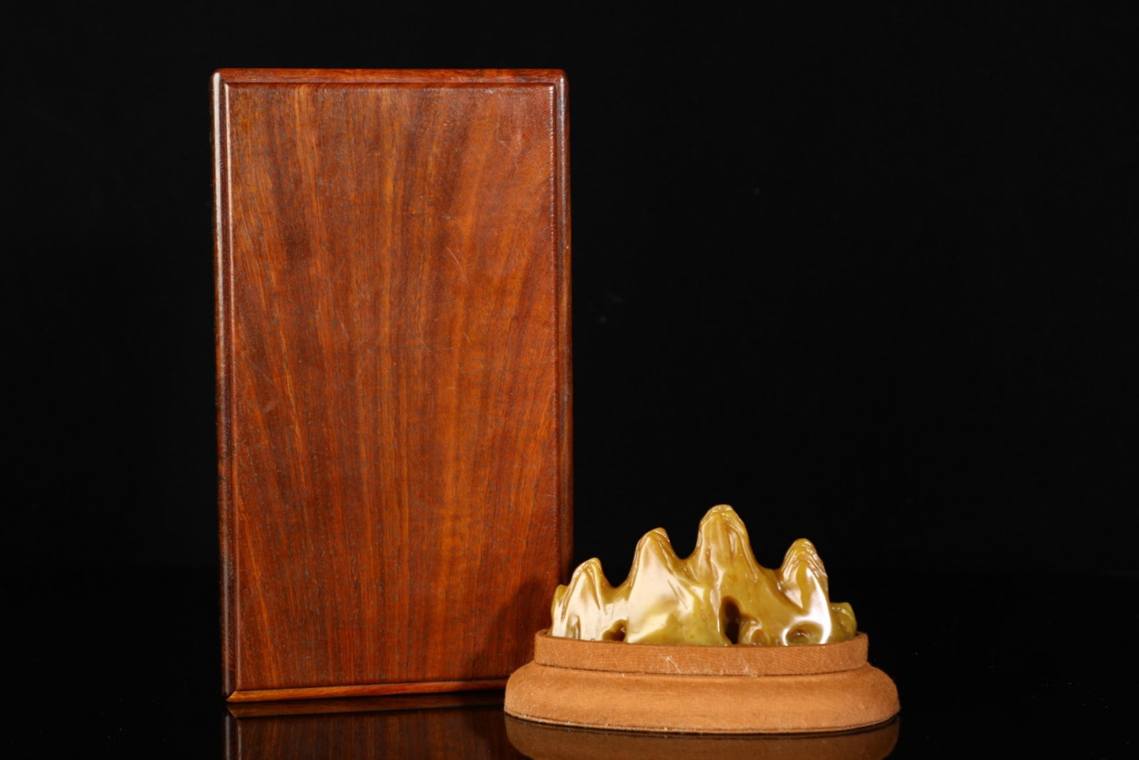 An Exquisite Tianhuang Stone Rockery Brush Holder: An Exquisite Tianhuang Stone Rockery Brush Holder,Qing Dynasty,China,Size:2.2inx4.3in,Weight:130g 田黄石山子笔架,中国清代