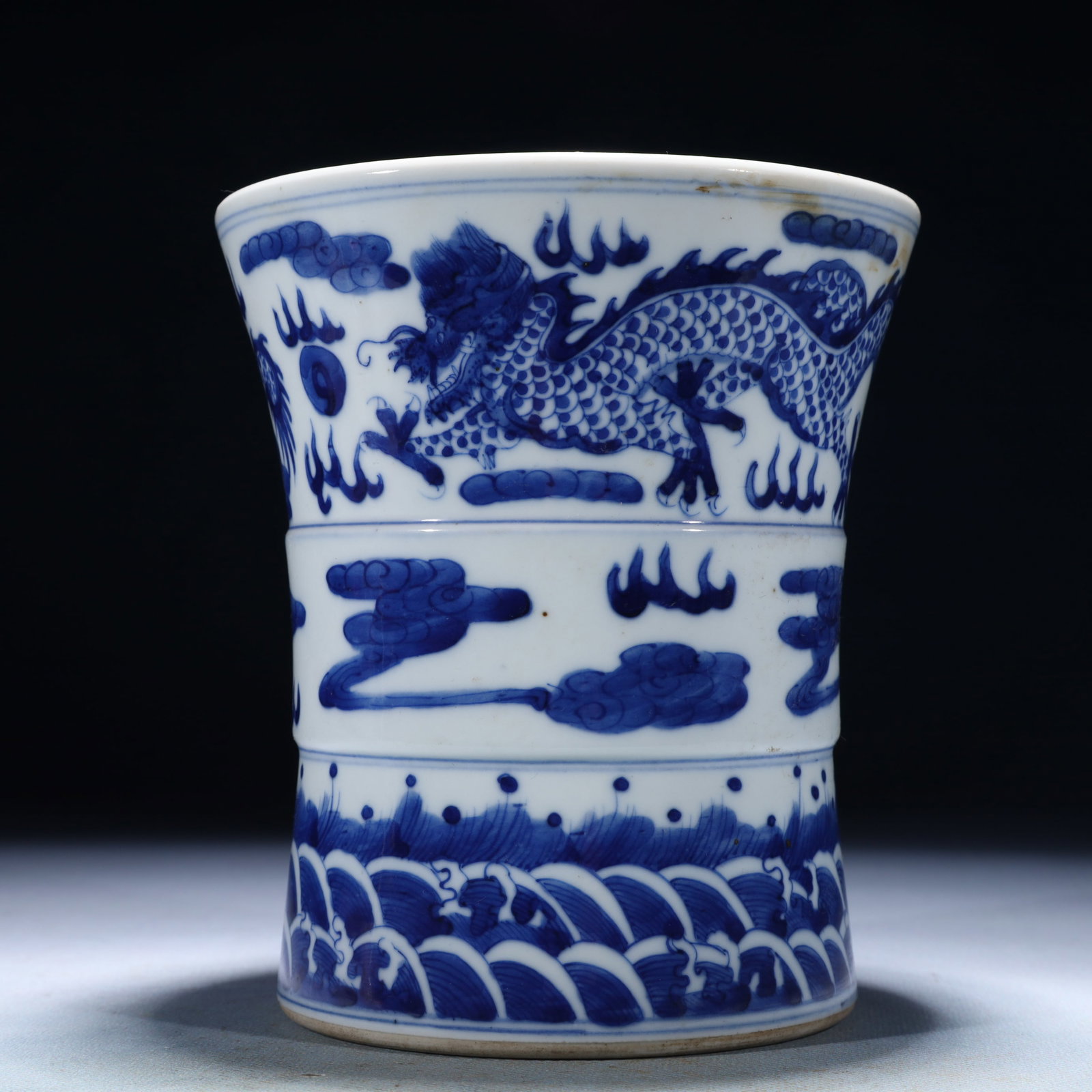 An Exquisite Blue and White Auspicious Cloud and Dragon Pattern Vase: An Exquisite Blue and White Auspicious Cloud and Dragon Pattern Vase,Qing Dynasty,China,Size:5.3inx5.9in,Weight:850g 青花祥云龙纹瓶,中国清&#