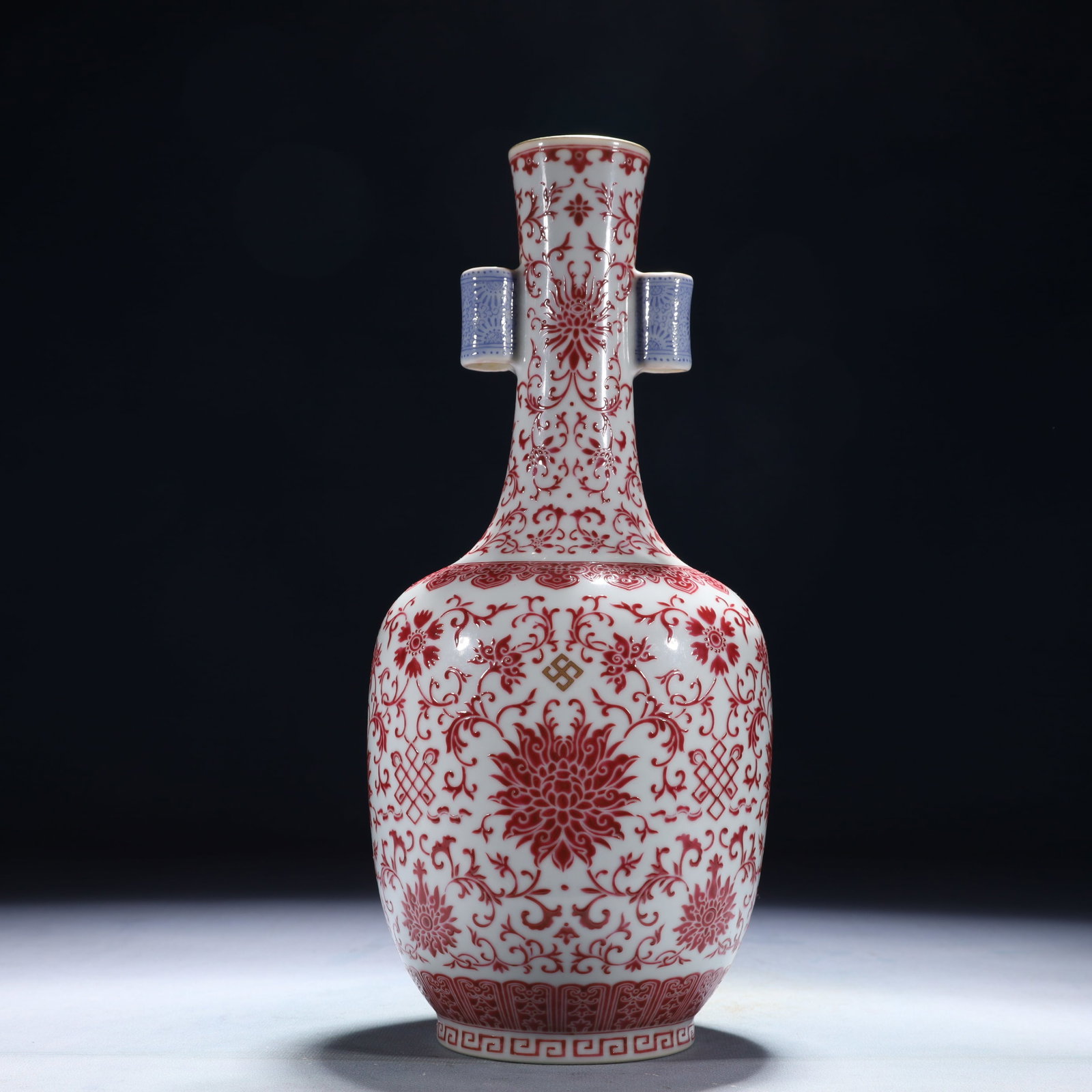 An Exquisite Blue and White Underglaze-Red Lotus Pattern Double-Ears Vase: An Exquisite Blue and White Underglaze-Red Lotus Pattern Double-Ears Vase,Qing Dynasty,China,Qianlong Six-character Mark,Size:4.7inx11.4in,Weight:950g