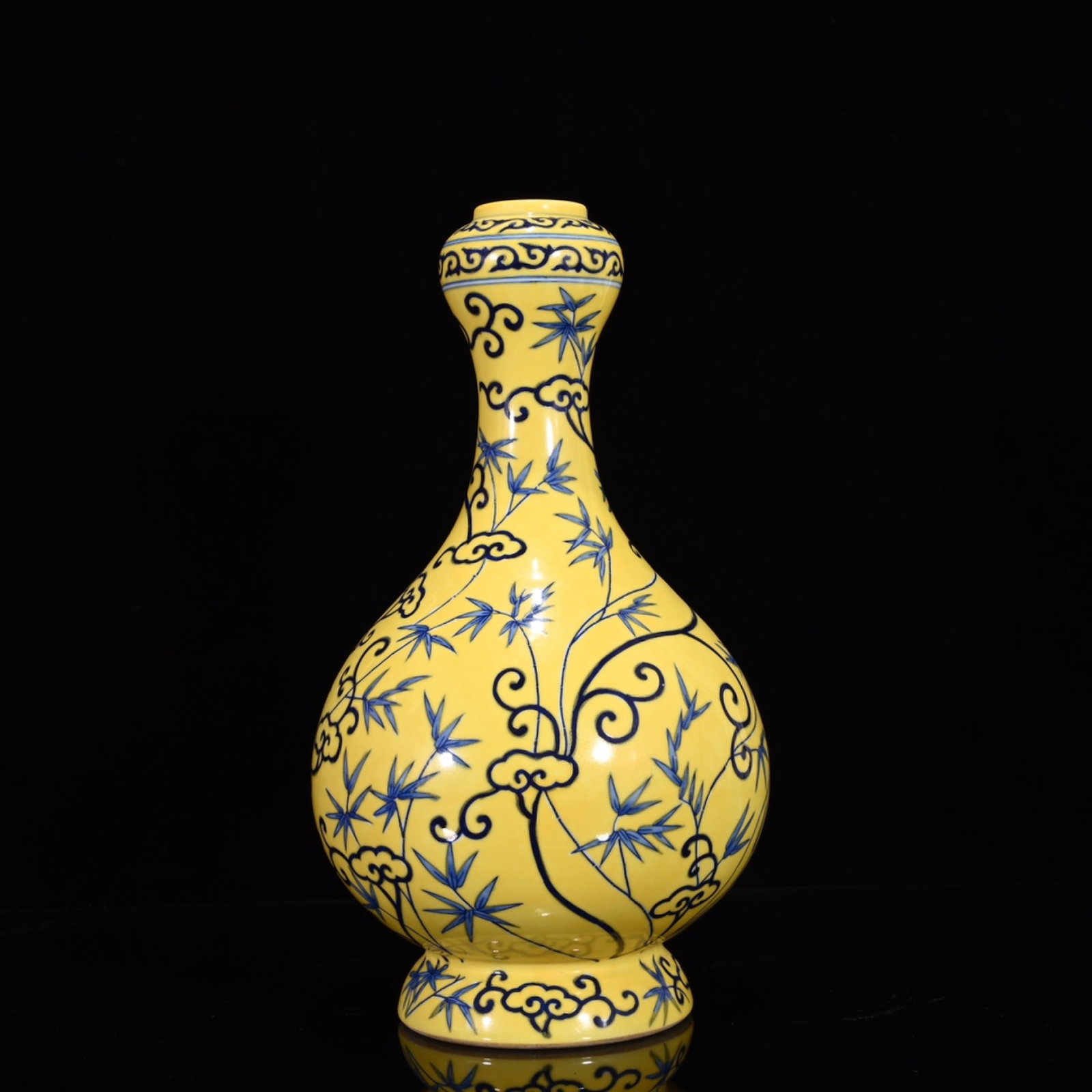 A Rare Yellow Ground Blue and White Bamboo Pattern Vase: A Rare Yellow Ground Blue and White Bamboo Pattern Vase,Qing Dynasty,China,Qianlong Six-character Mark,Size:13.8inx7.9in 黄地青花竹纹瓶,中国଀