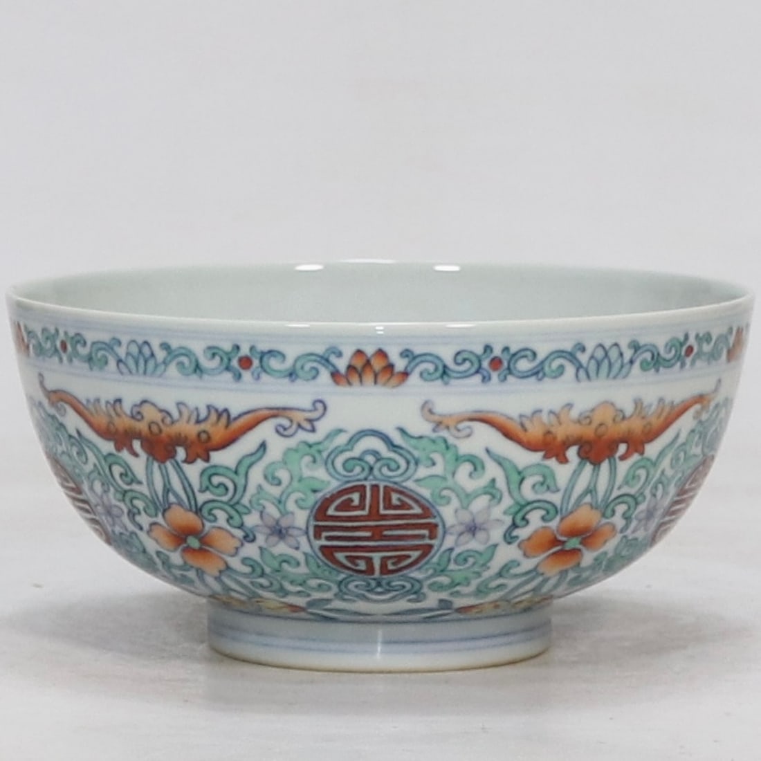 An Exquisite Doucai Lotus Pattern Bowl: An Exquisite Doucai Lotus Pattern Bowl,Qing Dynasty,China,Qianlong Six-character Mark,Size:3.1inx6.3in 斗彩缠枝莲纹碗,中国清代,乾
