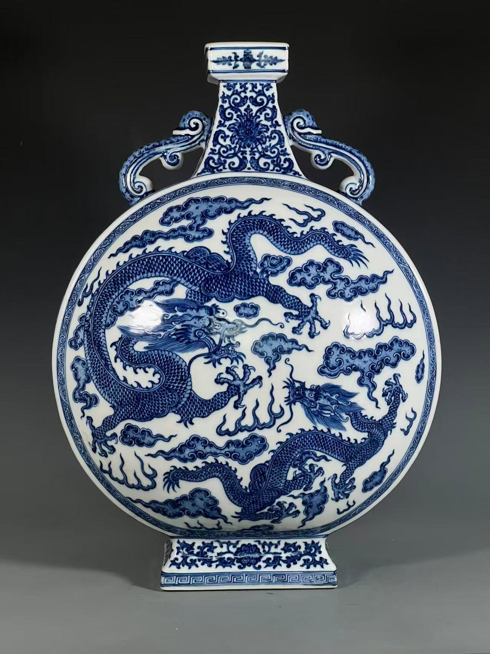 A Huge Blue and White Auspicious Cloud and Dragon Pattern Double-Ears Vase: A Huge Blue and White Auspicious Cloud and Dragon Pattern Double-Ears Vase,Qing Dynasty,China,Yongzheng Six-character Mark,Size:21.7inx7in