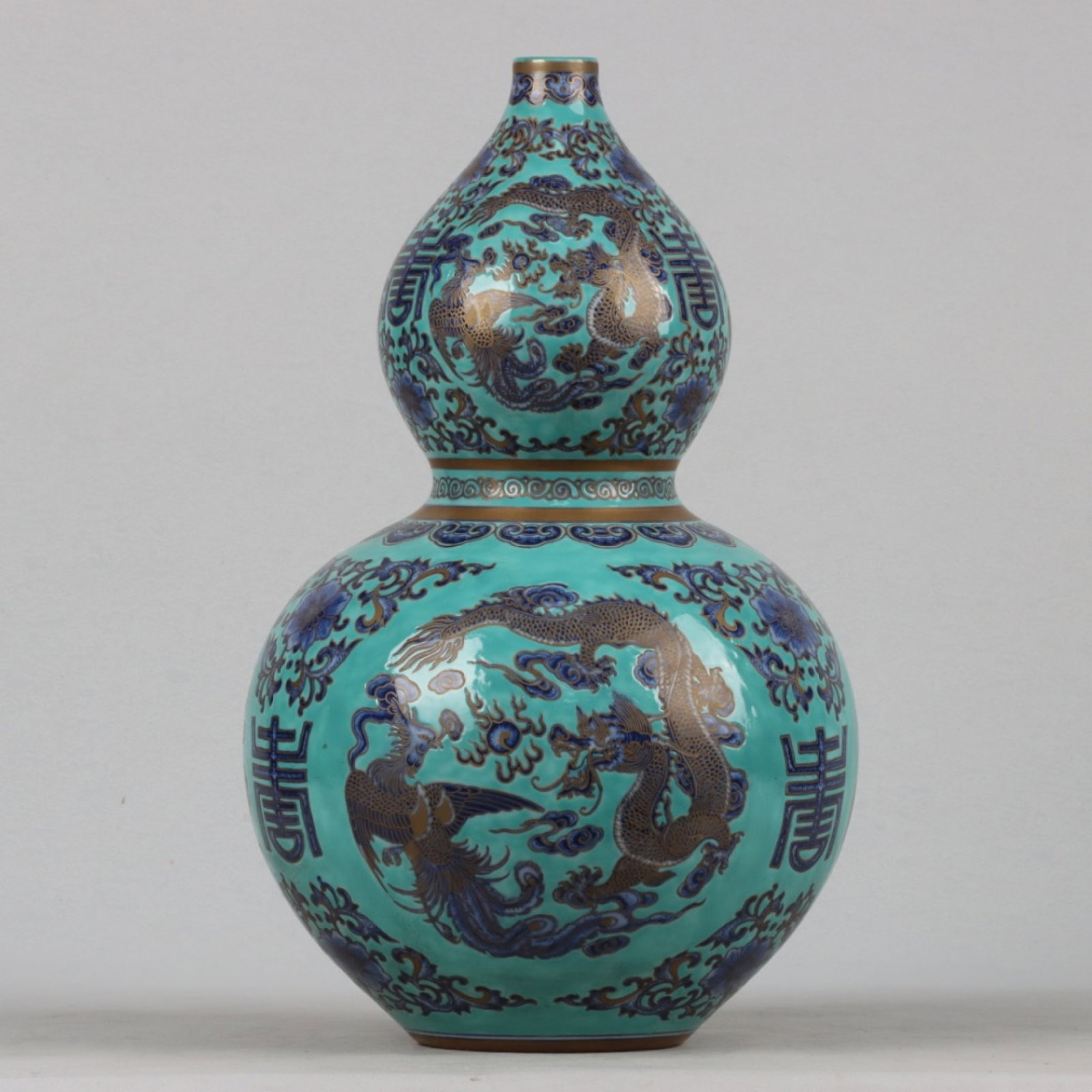 A Rare Robin's-Egg-Glazed Dragon and Phoenix Pattern Gourd-Shaped Vase: A Rare Robin's-Egg-Glazed Dragon and Phoenix Pattern Gourd-Shaped Vase,Qing Dynasty,China,Qianlong Six-character Mark,Size:14.4inx8.7in