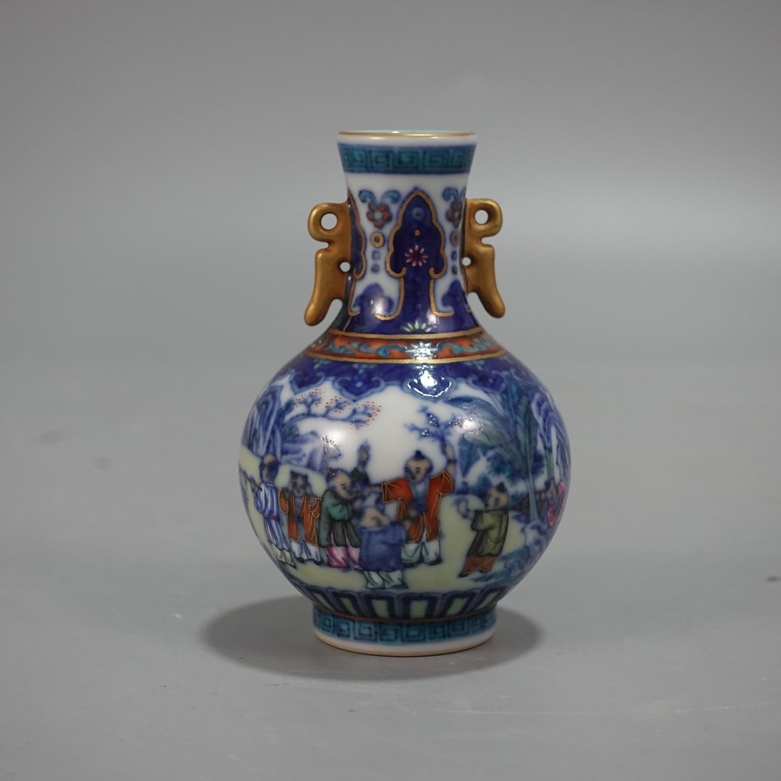 An Exquisite Blue and White Doucai Painted Gold Figure Pattern Double-Ears Vase: An Exquisite Blue and White Doucai Painted Gold Figure Pattern Double-Ears Vase,Qing Dynasty,China,Qianlong Four-character Mark,Size:3.3inx2.1in 青花斗彩描金人
