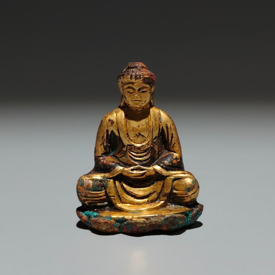 A Solemn Gilt Bronze Statue of Sakyamuni: A Solemn Gilt Bronze Statue of Sakyamuni,Tang Dynasty,China,Size:2.2inx1.6inx1in 铜鎏金释迦摩尼像,中国唐代