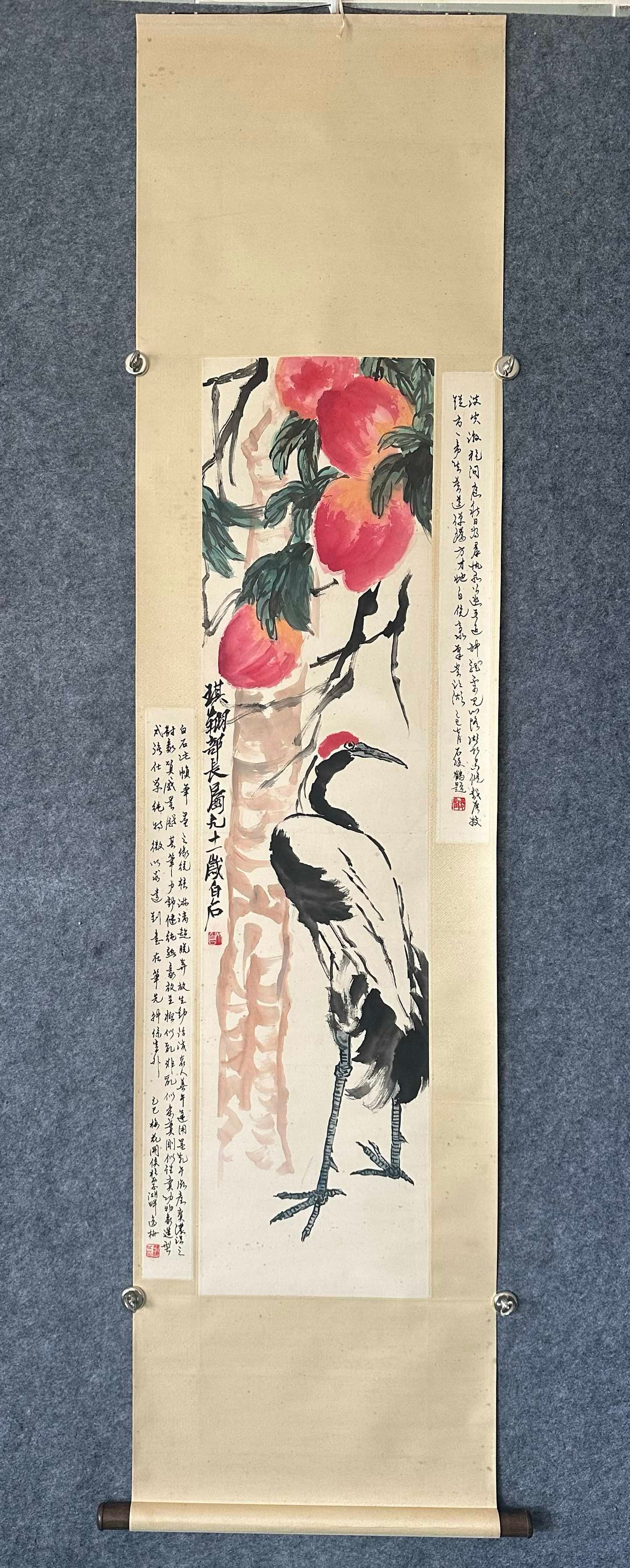A Chinese Vertical Scroll Ink Painting of Crane and Peach on Paper,Qi Baishi: A Chinese Vertical Scroll Ink Painting of Crane and Peach on Paper,Qi Baishi,Size:(Without frame)13.4inx54.3in 一幅中国水墨鹤桃图立轴,
