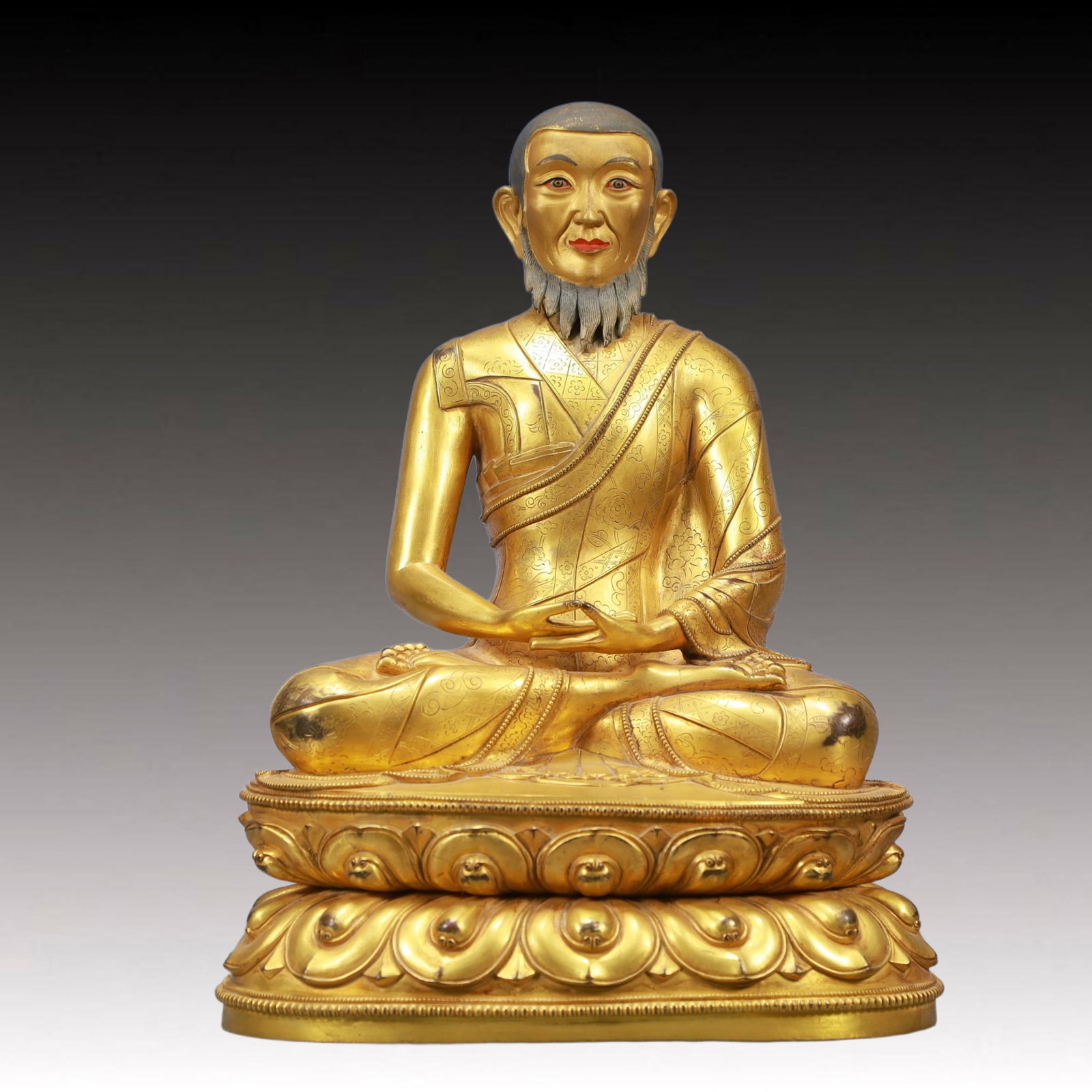 A Solemn Gilt Bronze Statue of Guru: A Solemn Gilt Bronze Statue of Guru,Ming Dynasty, China,Size:8.7inx7.1inx11.4in Weight:4950g 铜鎏金上师像,中国明代