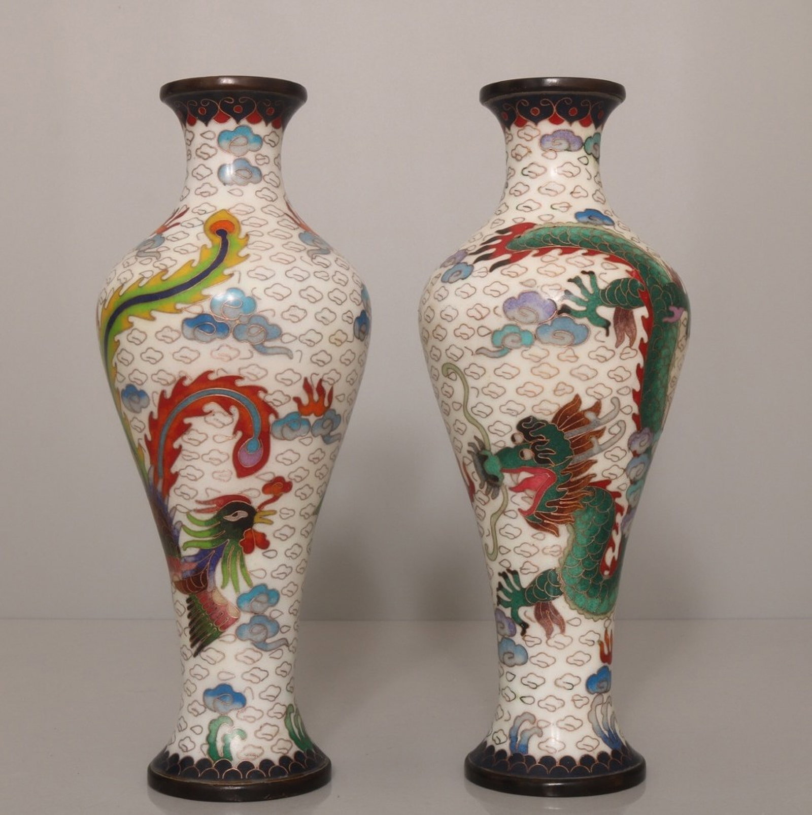 A Pair of Exquisite Cloisonne Dragon and Phoenix Pattern Vases: A Pair of Exquisite Cloisonne Dragon and Phoenix Pattern Vases,Qing Dynasty,China,Qianlong Four-Character Mark,Size:9.8inx3.9in*2,Weight:2540g