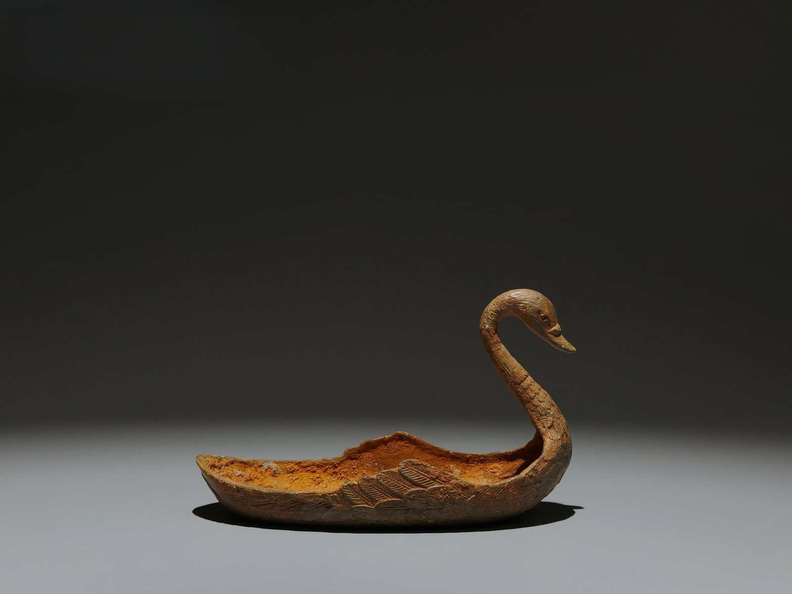 An Archaic Bronze Goose Brush Washer: An Archaic Bronze Goose Brush Washer,Han Dynasty,China,Size:3.5inx5.9inx3.1in 青铜鹅笔洗,中国汉代