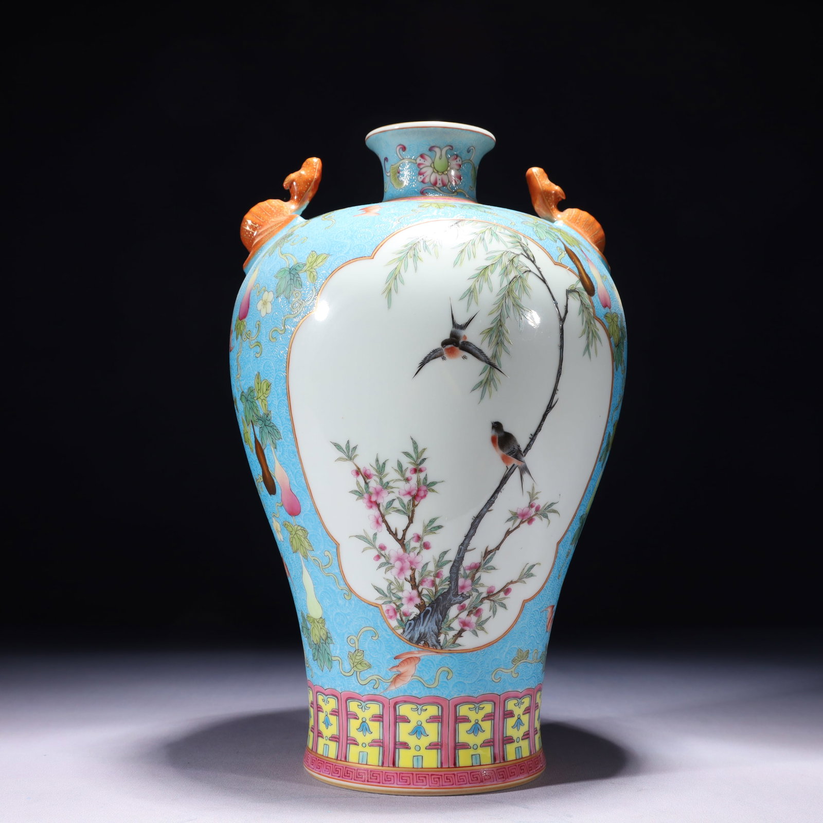 An Exquisite Turquoise Glazed Famille-Rose Painted Gold Flower and Bird Pattern Beast-Ears Vase: An Exquisite Turquoise Glazed Famille-Rose Painted Gold Flower and Bird Pattern Beast-Ears Vase,Qing Dynasty,China,Qianlong Six-character Mark,Size:7.1inx12.6in,Weight:2100g