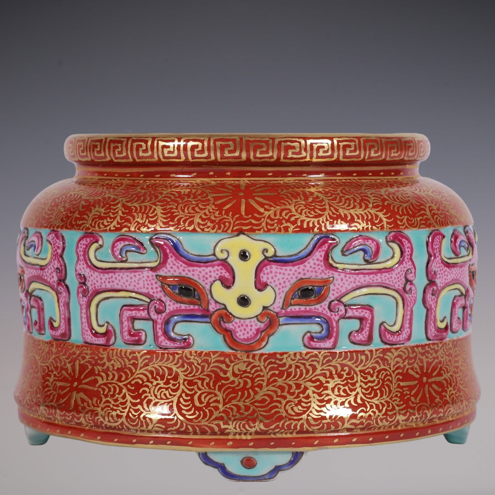 An Exquisite Enamel Iron-Red Glazed Painted Gold Beast-Face Pattern Four Legs Water Pot: An Exquisite Enamel Iron-Red Glazed Painted Gold Beast-Face Pattern Four Legs Water Pot,Qing Dynasty, China,Qianlong Six-character Mark,Size:3.1inx3.9in珐琅彩矾红釉