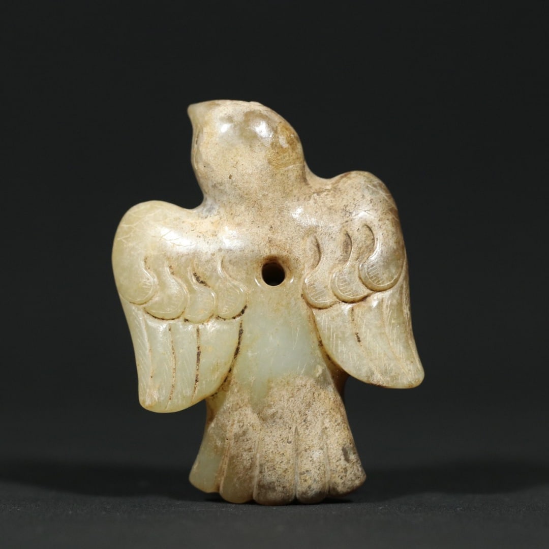 An Exquisite White Jade Bird Pendant: An Exquisite White Jade Bird Pendant,Han Dynasty,China,Size:2.6inx1.8inx0.8in,Weight:73.7g白玉鸟挂件,中国汉代,Size:6.6cmx4.6cmx2cm,Weight:73.7g