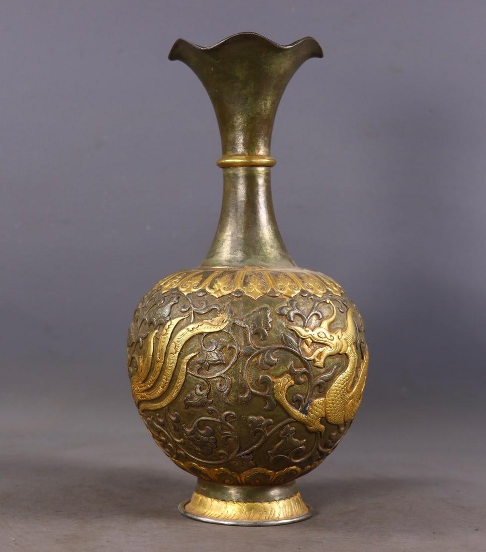 An Exquisite Gilt Bronze Dragon and Phoenix Pattern Vase: An Exquisite Gilt Bronze Dragon and Phoenix Pattern Vase,Tang Dynasty,China,Zhenguan Four-character Mark,Size:9.8inx4.3in,Weight:844g铜鎏金龙凤纹瓶，