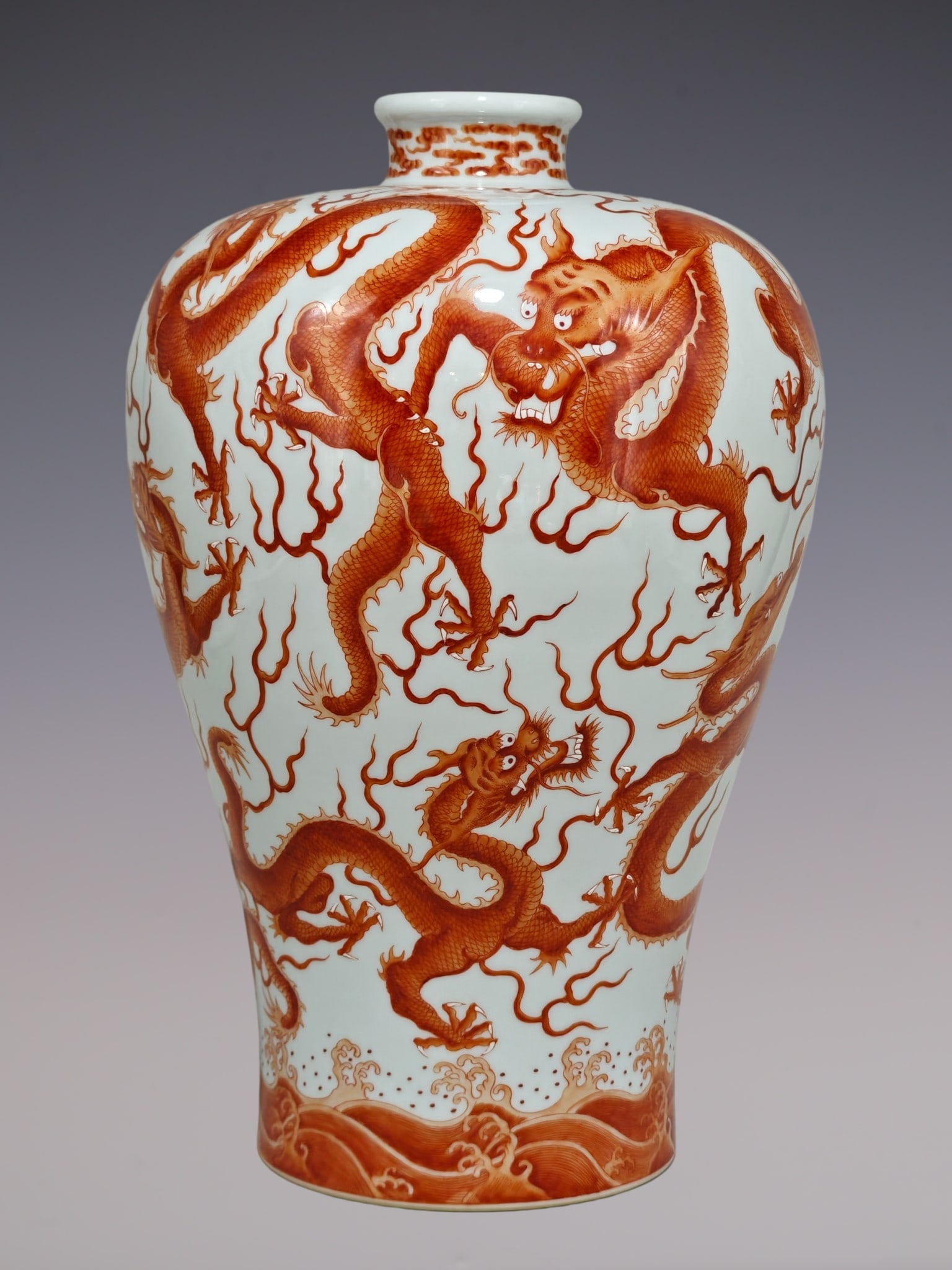 A Rare Iron-Red Glazed Seawater and Dragon Pattern Vase: A Rare Iron-Red Glazed Seawater and Dragon Pattern Vase,Qing Dynasty, China,Yongzheng Six-character Mark,Size:14.9inx9.4in矾红釉海水龙纹瓶,中Þ