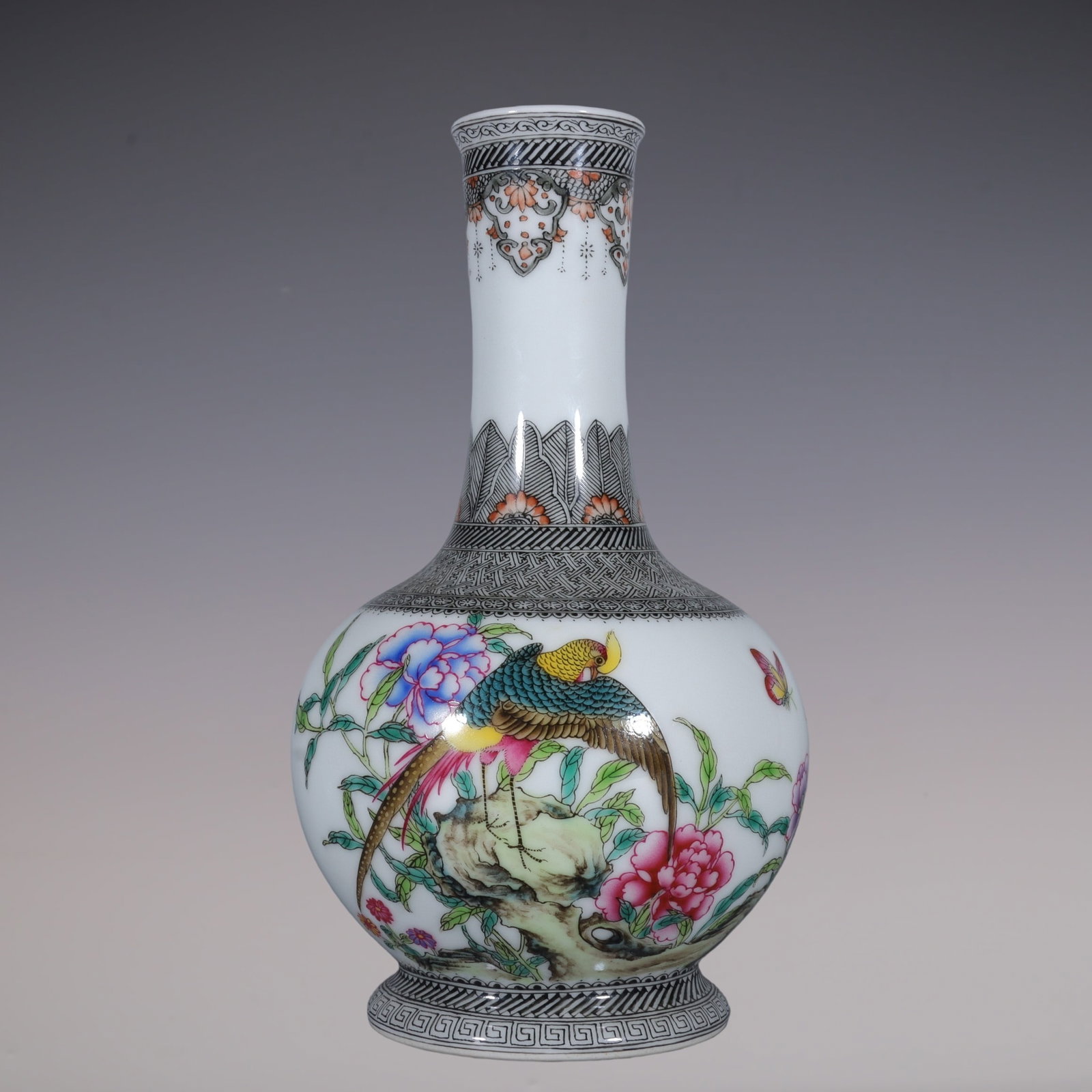 An Exquisite Enamel Ink Color Flower and Bird Pattern Vase,With Poem: An Exquisite Enamel Ink Color Flower and Bird Pattern Vase,With Poem,Qing Dynasty, China,Yongzheng Four-character Mark,Size:7.9inx1.7inx3.1in珐琅彩墨彩花鸟