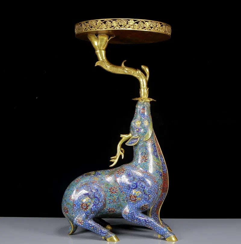 An Exquisite Cloisonne Flower Pattern Deer-Shaped Candlestick: An Exquisite Cloisonne Flower Pattern Deer-Shaped Candlestick Qing Dynasty, China Qianlong Four-character Mark Size:34.6inx18.5in Weight:28kg景泰蓝鹿托盘 中&#