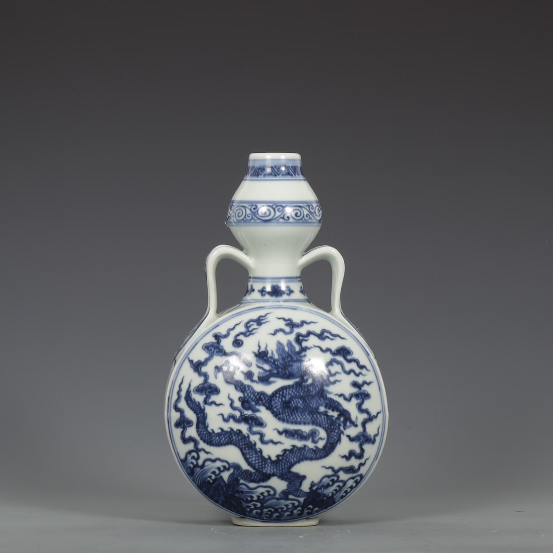 An Exquisite Blue and White Seawater Auspicious Cloud and Dragon Pattern Double-Ears Vase: An Exquisite Blue and White Seawater Auspicious Cloud and Dragon Pattern Double-Ears Vase,Ming