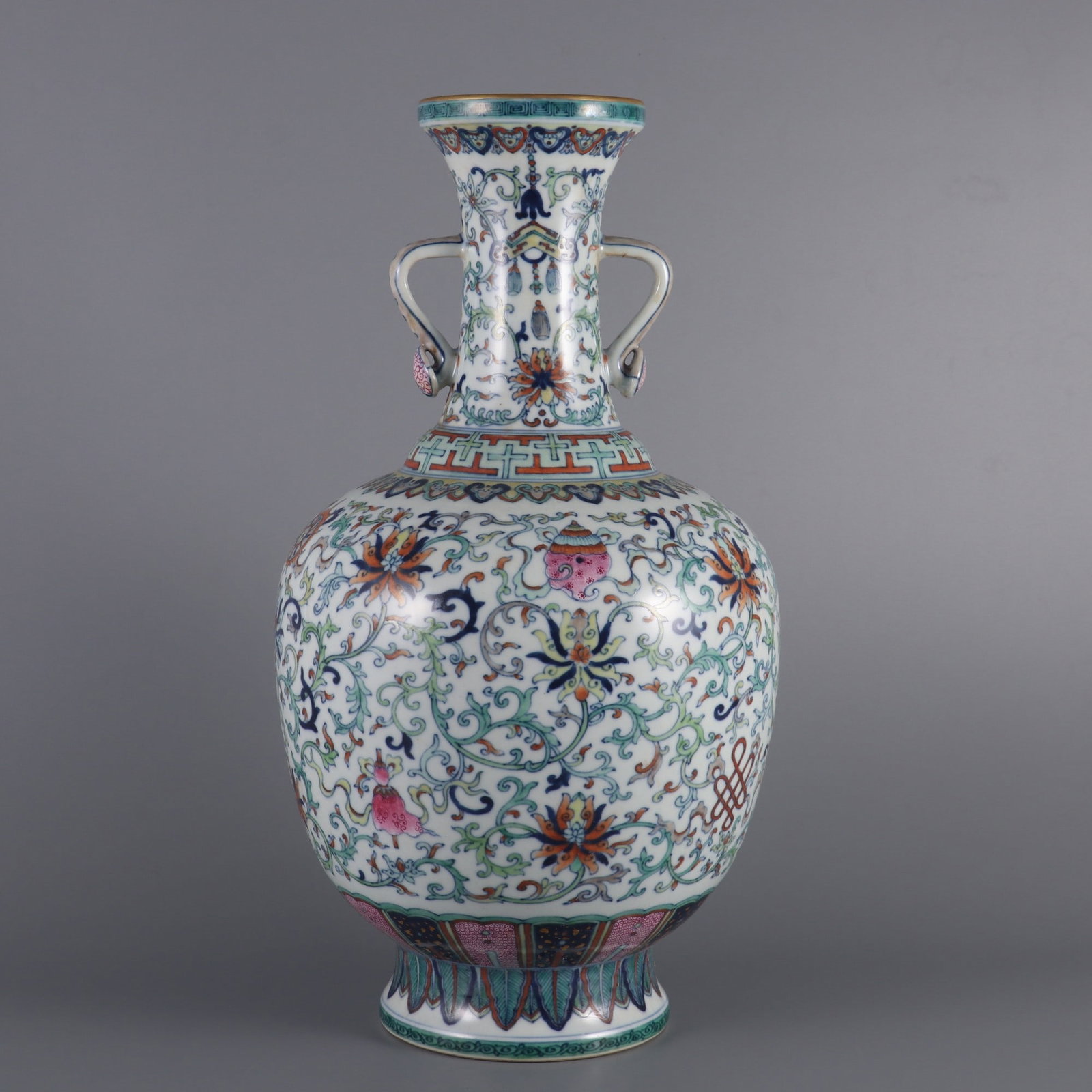 A Rare Doucai Painted Gold Lotus and Eight Treasures Pattern Ruyi-Ears Vase: A Rare Doucai Painted Gold Lotus and Eight Treasures Pattern Ruyi-Ears Vase,Qing Dynasty, China,Qianlong Six-character Mark,Size:15.4inx8.1inx3.6in斗彩描金缠枝ő