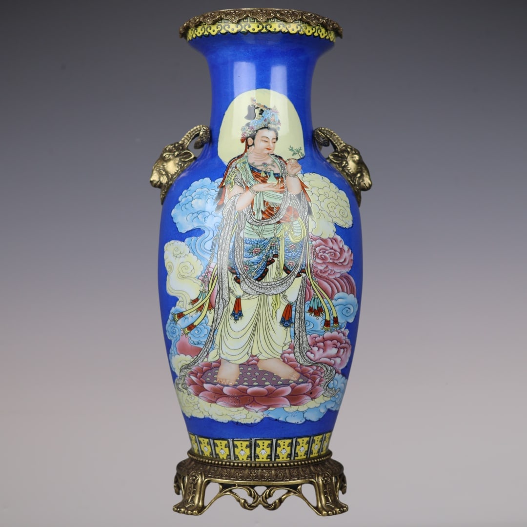 A Huge Blue Ground Famille-Rose Inlaid Bronze Auspicious Cloud and Statue of Avalokitesvara Pattern: A Huge Blue Ground Famille-Rose Inlaid Bronze Auspicious Cloud and Statue of Avalokitesvara Pattern Sheep-Ears Vase,Qing Dynasty,China,Kangxi Six-character