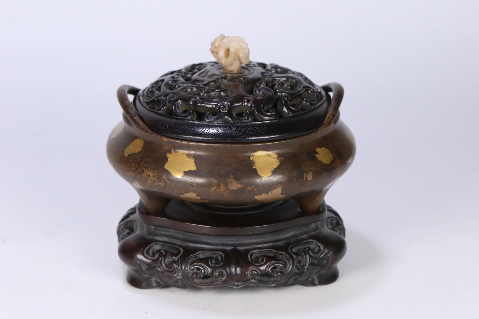 An Exquisite Bronze Sprinkled-Gold Double-Ears Tripod Censer,With Zitanwood Base,With Inlaid White: An Exquisite Bronze Sprinkled-Gold Double-Ears Tripod Censer,With Zitanwood Base,With Inlaid White Jade Zitanwood Cover,Ming Dynasty,China,Xuande Six-character Mark,Size:5.1inx5.2in,Weight:976.5gŽ