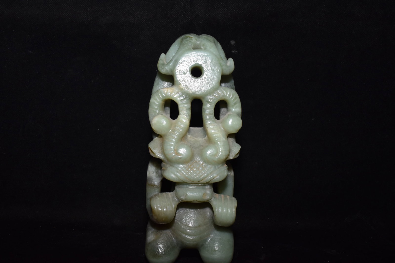 An Exquisite White Jade Sun God Ornament: An Exquisite White Jade Sun God Ornament,Hongshan