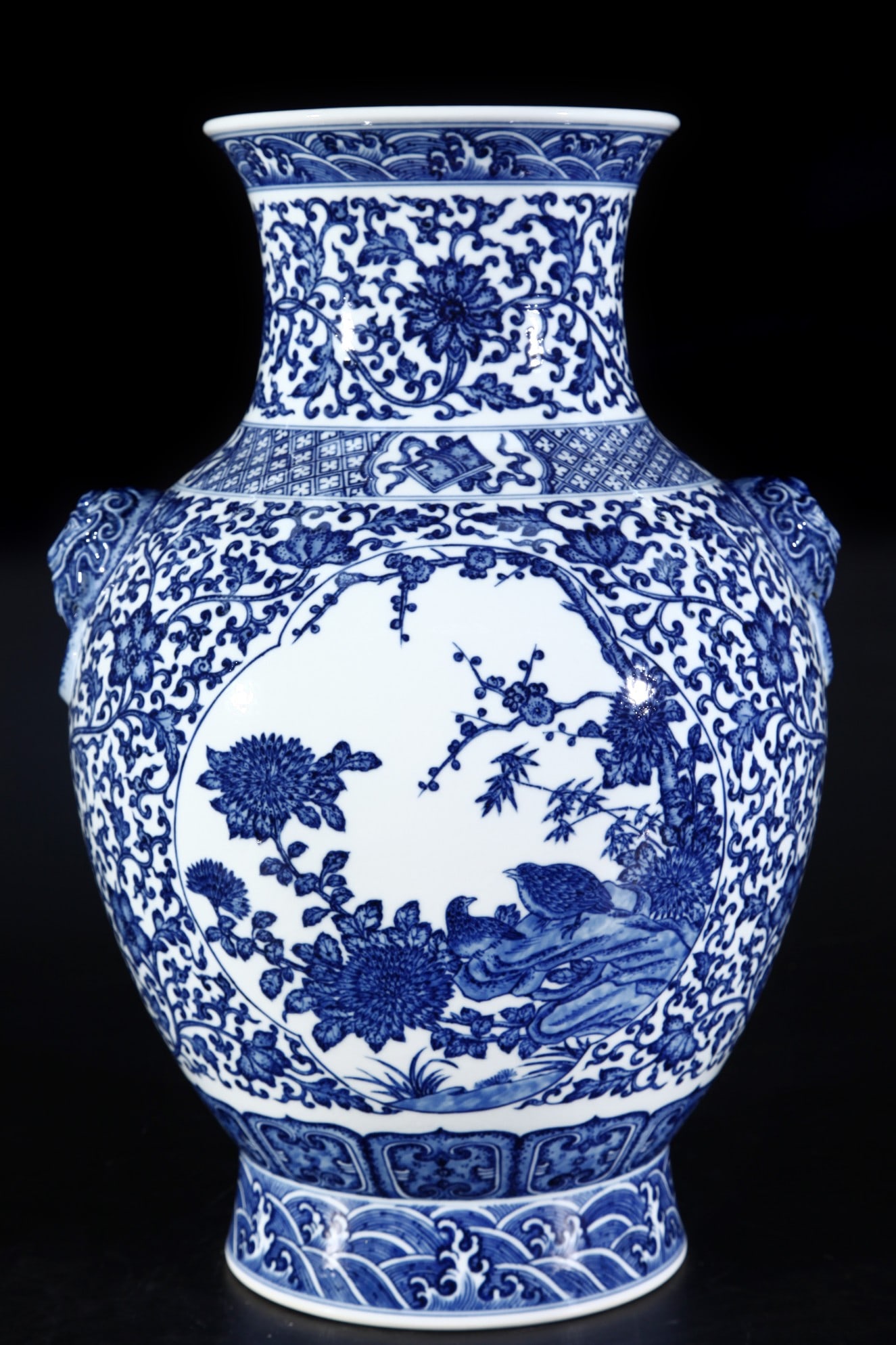 A Huge Blue and White Flower and Bird Pattern Beast-Ears Vase: A Huge Blue and White Flower and Bird Pattern Beast-Ears Vase,Qing Dynasty, China,Qianlong Six-character Mark,Size:18.5inx12.6inx7.5in青花花鸟纹兽耳瓶,&