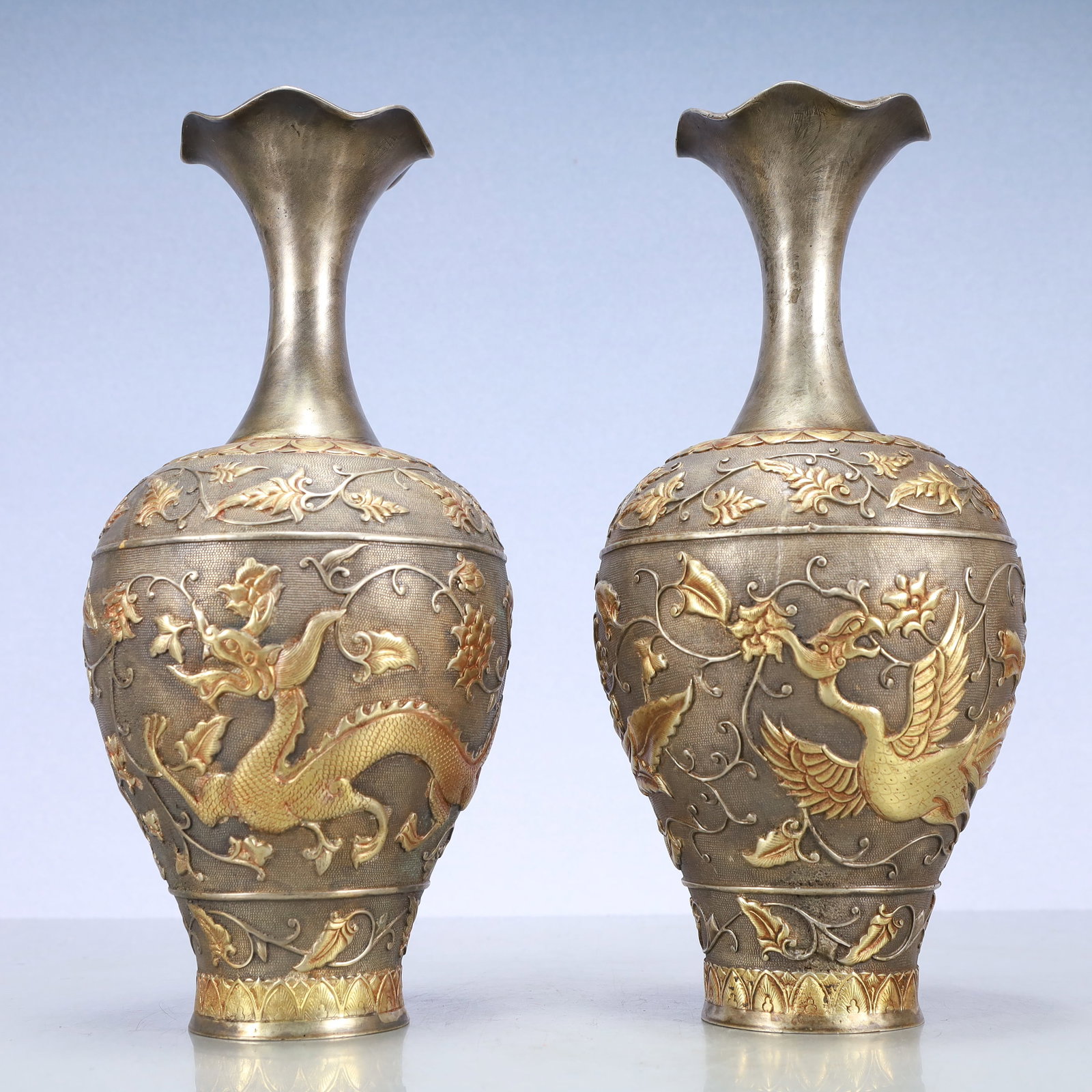 A Exquisite A pair of Gilt Silver Lotus Pattern Dragon and Phoenix Pattern Vase: A Exquisite A pair of Gilt Silver Lotus Pattern Dragon and Phoenix Pattern Vase Tang Dynasty, China Zhenguan Four-character Mark Size:6.3inx12.6in