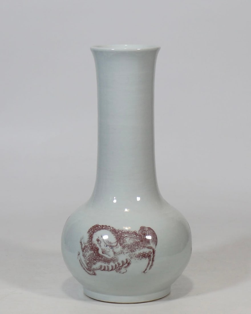 A Rare Blue and White Underglaze-Red Lion Pattern Vase: A Rare Blue and White Underglaze-Red Lion Pattern Vase,Qing Dynasty, China,Qianlong Six-character Mark,Size:12.4inx3.4in青花釉里红狮纹瓶,中国