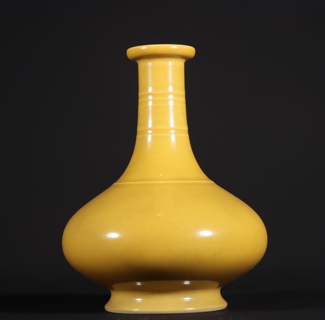 A Rare Yellow Glazed Vase: A Rare Yellow Glazed Vase Qing Dynasty, China Yongzheng Six-character Mark Size:6.1inx4.7in中国清代 鸡油黄扁肚瓶 大清雍