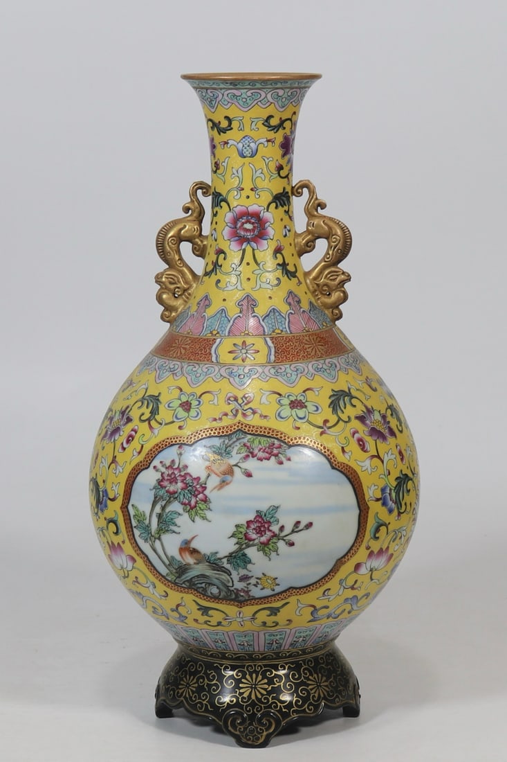 A Huge Yellow Ground Enamel Painted Gold Flower and Bird Pattern Dragon-Ears Vase: A Huge Yellow Ground Enamel Painted Gold Flower and Bird Pattern Dragon-Ears Vase,Qing Dynasty, China,Qianlong Four-character Mark,Size:16.2inx3.5in黄地珐琅彩描%