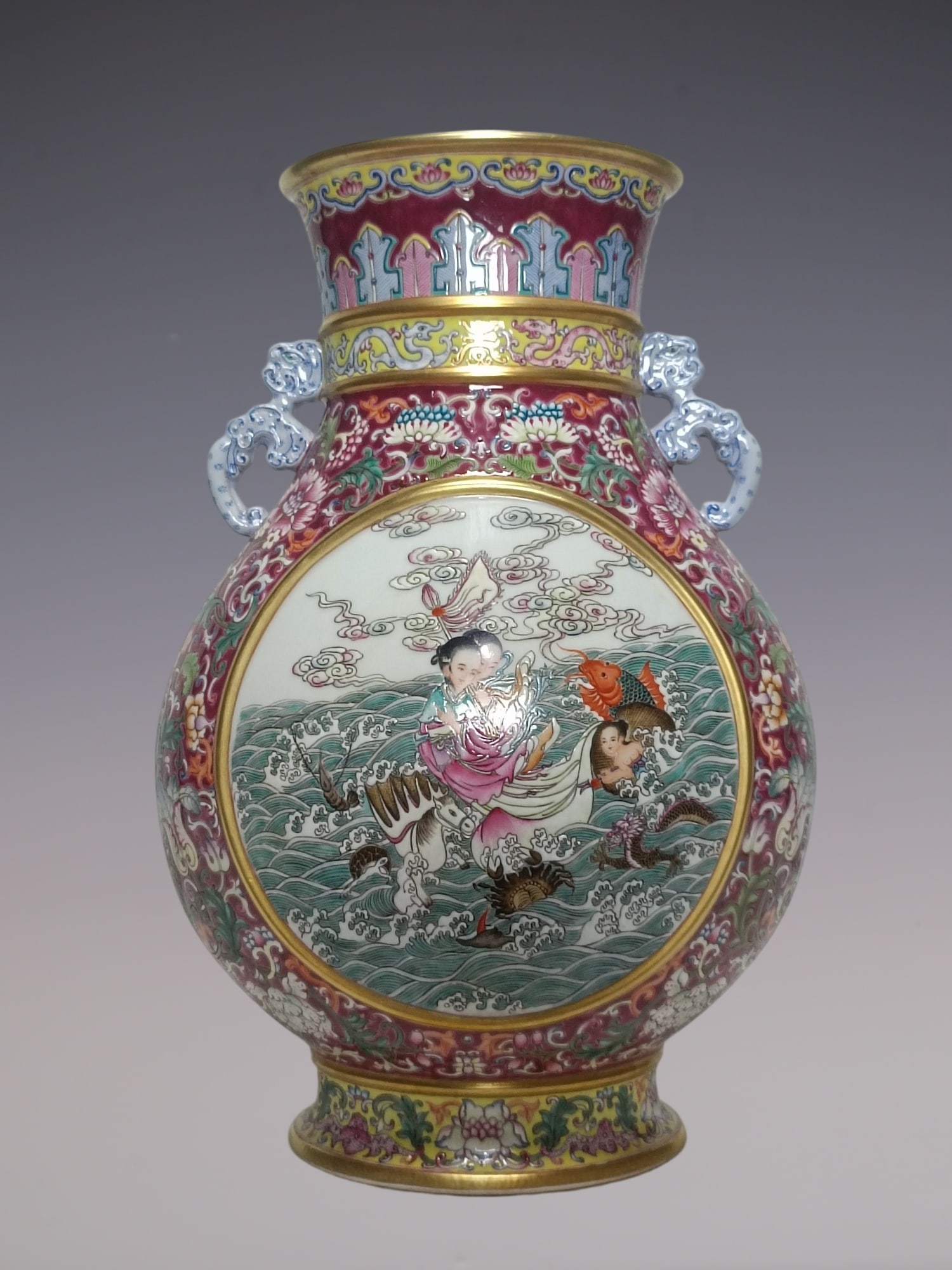 A Rare Enamel Ruby Red-Ground Painted Gold Seawater and Figure Pattern Double-Ears Vase: A Rare Enamel Ruby Red-Ground Painted Gold Seawater and Figure Pattern Double-Ears Vase,Qing Dynasty, China,Yongzheng Four-character Mark,Size:14.6inx10.2in珐琅彩胭脂 