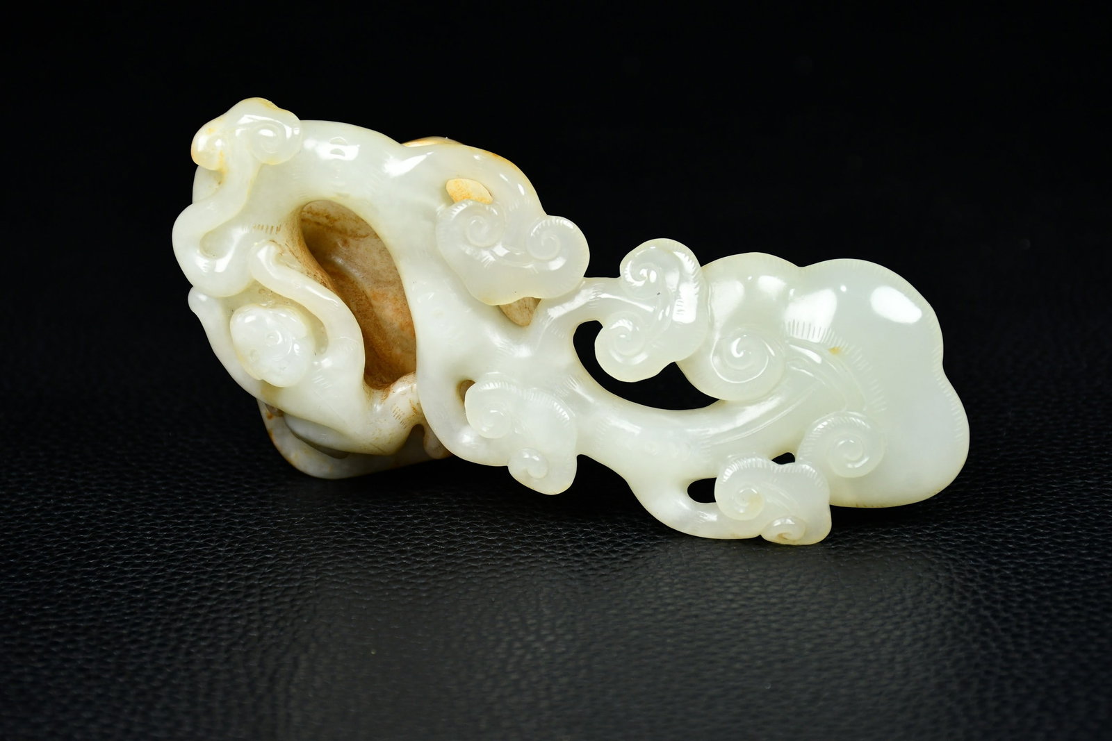 An Exquisite White Jade Hollow Monkey Pattern Ganoderma lucidum Hand Piece (1 of 9)