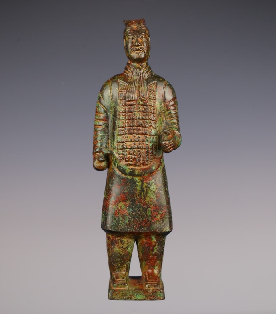 An Archaic Bronze Figure Ornament: An Archaic Bronze Figure Ornament,Han Dynasty, China,Size:3.9inx13.4in,Weight:1700g青铜人物摆件,中国汉代,Size:10cmx34cm,Weight:1700g