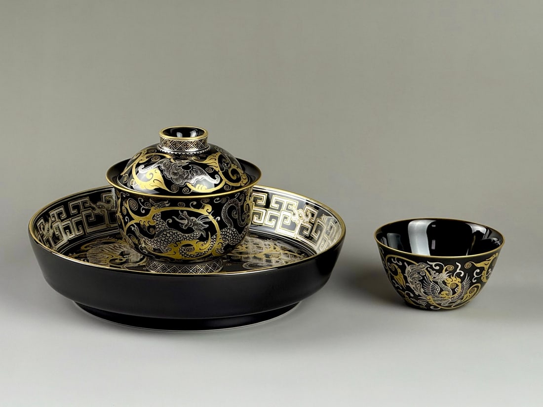 A Set of Fine Black Glazed Painted Gold and Silver Auspicious Beast Pattern Teaware: A Set of Fine Black Glazed Painted Gold and Silver Auspicious Beast Pattern Teaware,Qing Dynasty,China,Qianlong Six-character Mark,Size:(Plate)6.8inx1.6inx5.1in,(Bowl with
