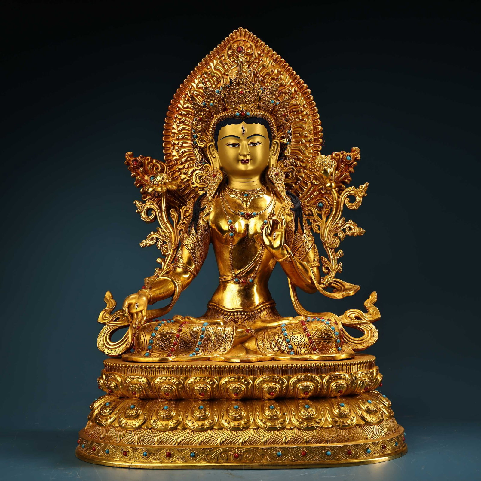 A Solemn Gilt Bronze Statue of Tara,Inlaid Gems and Turquoise: A Solemn Gilt Bronze Statue of Tara,Inlaid Gems and Turquoise,Qing Dynasty,China,Size:19.7inx13.4in,Weight:7900g铜鎏金度母像，嵌宝石和