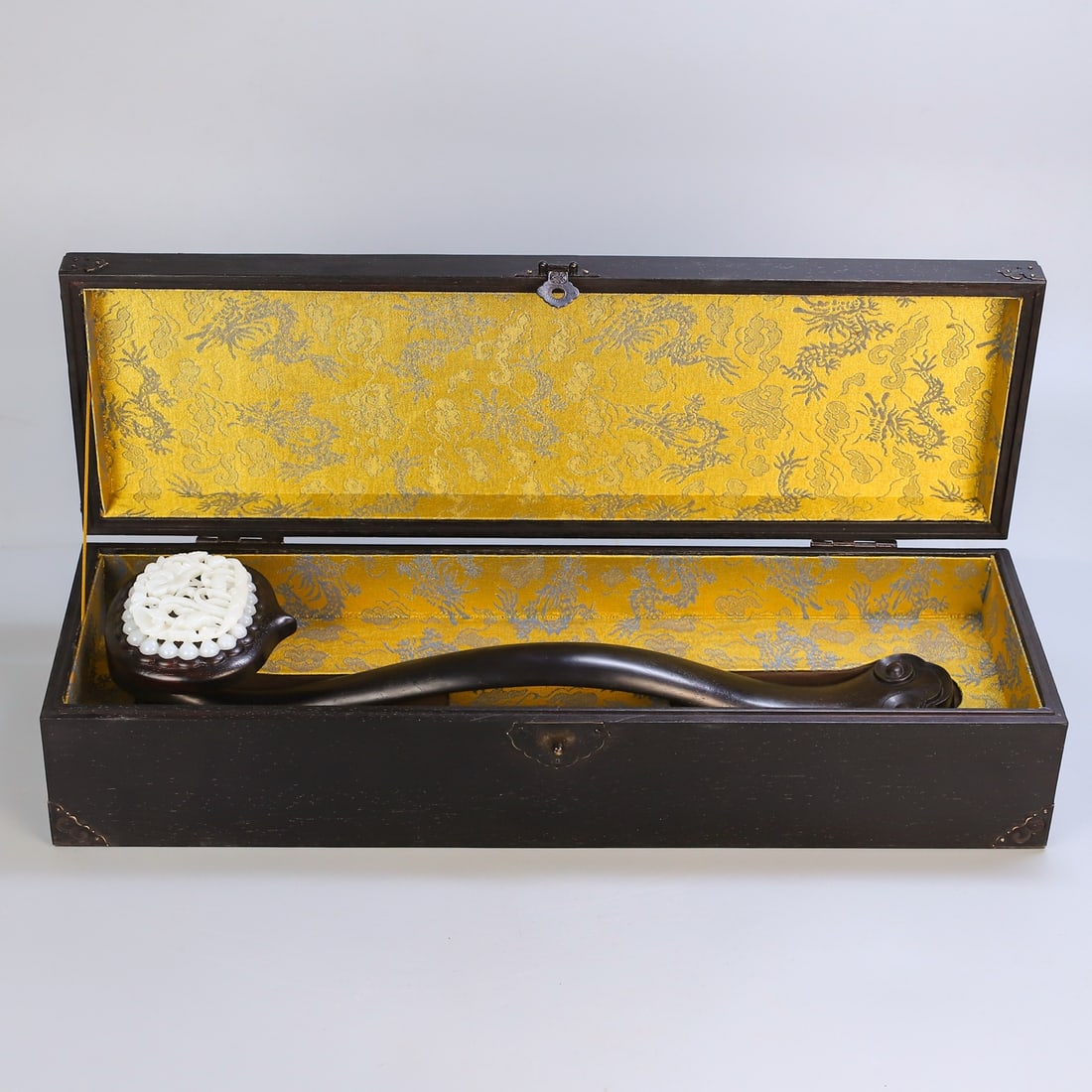 A Huge Zitanwood Inlaid White Jade Hollow Flower and Bird Pattern Ruyi: A Huge Zitanwood Inlaid White Jade Hollow Flower and Bird Pattern Ruyi,Qing Dynasty,China,Size:(Box)5.1inx21.3in,(Ruyi)18.1inx5.1in,Total