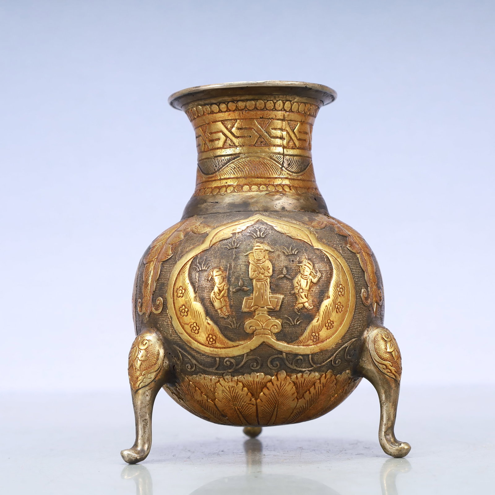 A Exquisite Gilt Silver Character and Story Pattern Tripod Vase: A Exquisite Gilt Silver Character and Story Pattern Tripod Vase Tang Dynasty, China Size:4.5inx5.9in