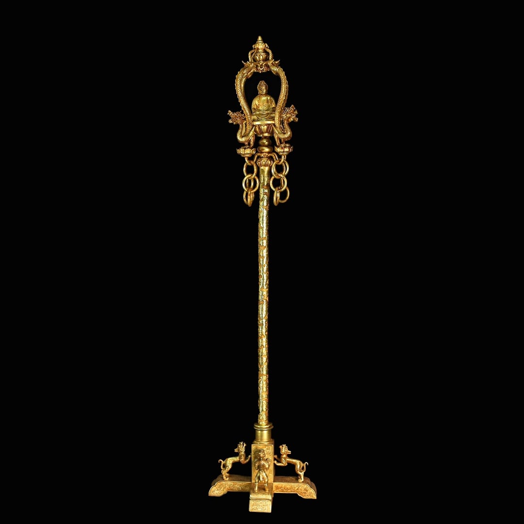 A Huge Gilt Bronze Auspicious Cloud and Dragon Pattern Khakkhara: A Huge Gilt Bronze Auspicious Cloud and Dragon Pattern Khakkhara,Qing Dynasty,China,Qianlong Four-character Mark,Size:34.4inx8.7in,Weight:3260g铜鎏金祥云龙纹&
