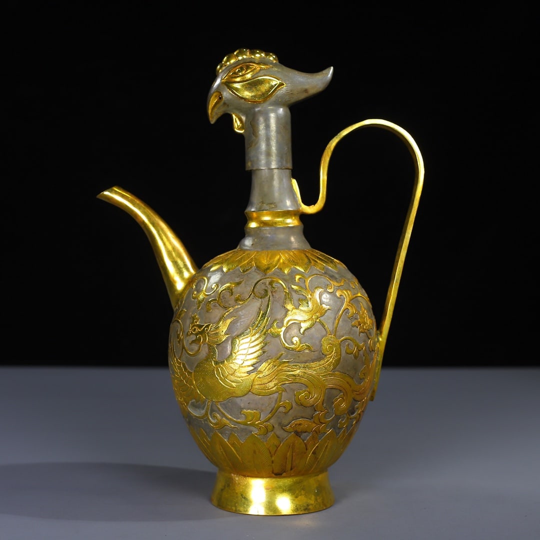 An Exquisite Gilt Silver Lotus and Phoenix Pattern Phoenix-head Flagon: An Exquisite Gilt Silver Lotus and Phoenix Pattern Phoenix-head Flagon,Tang Dynasty,China,Zhenguan Four-character
