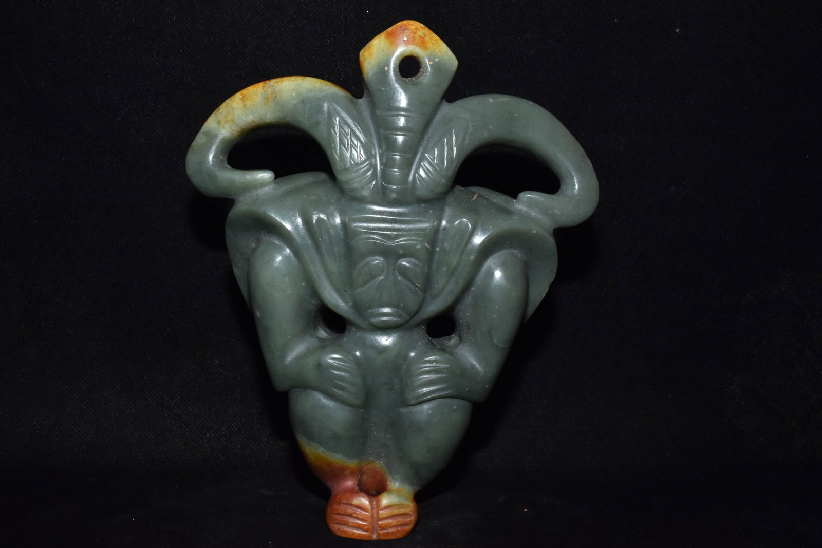 An Exquisite Hemo Jade Sun God Pendant: An Exquisite Hemo Jade Sun God Pendant,Hongshan Culture,Size:6.1inx7.7in,Weight:1230g河磨玉太阳神挂件,红山文化,Size:15.5cmx19.5c