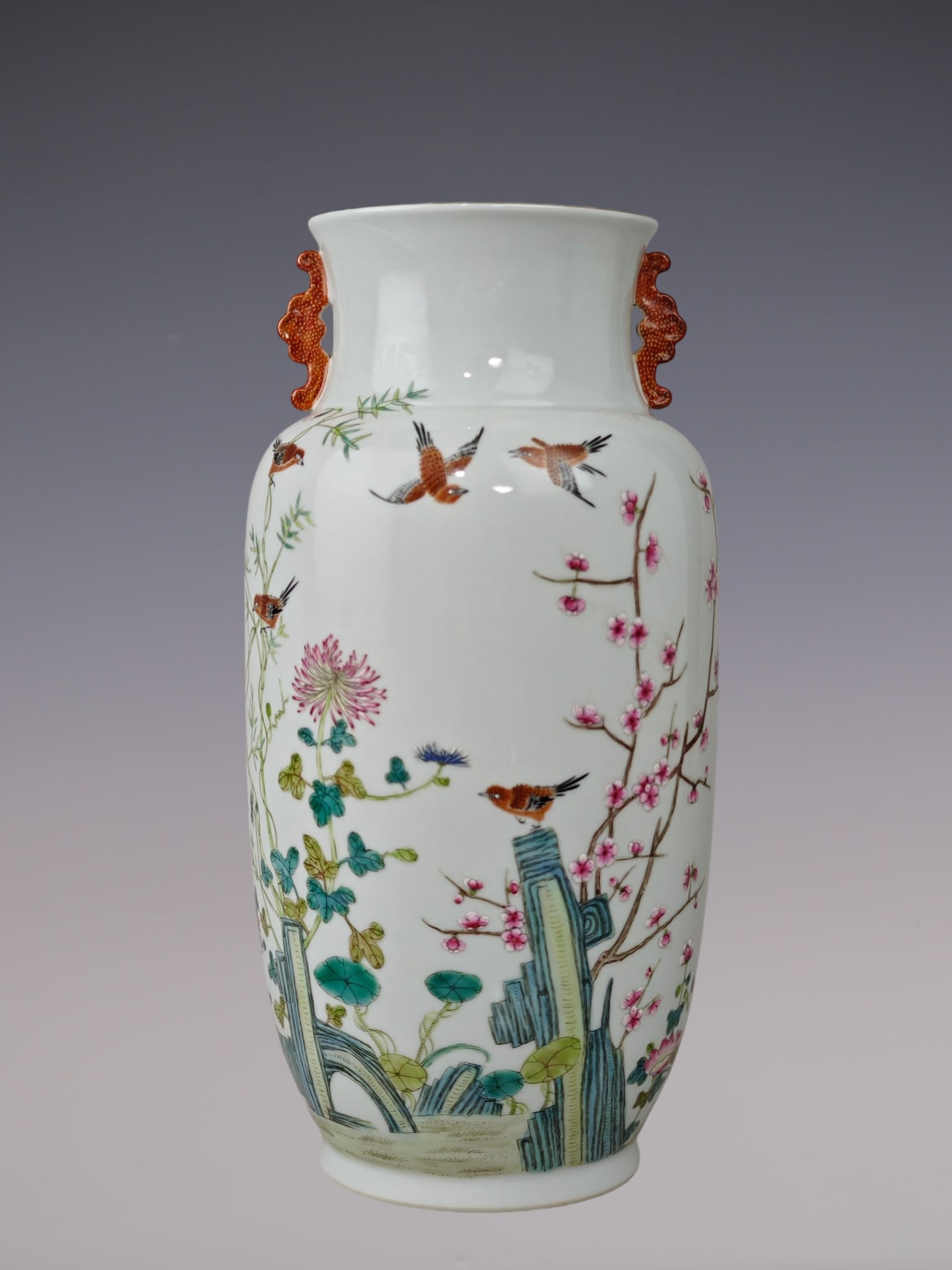 A Rare Famille-Rose Flower and Bird Pattern Double-Ears Vase: A Rare Famille-Rose Flower and Bird Pattern Double-Ears Vase,Qing Dynasty, China,Qianlong Six-character Mark,Size:12.6inx6.7in粉彩花鸟纹双耳瓶,中&