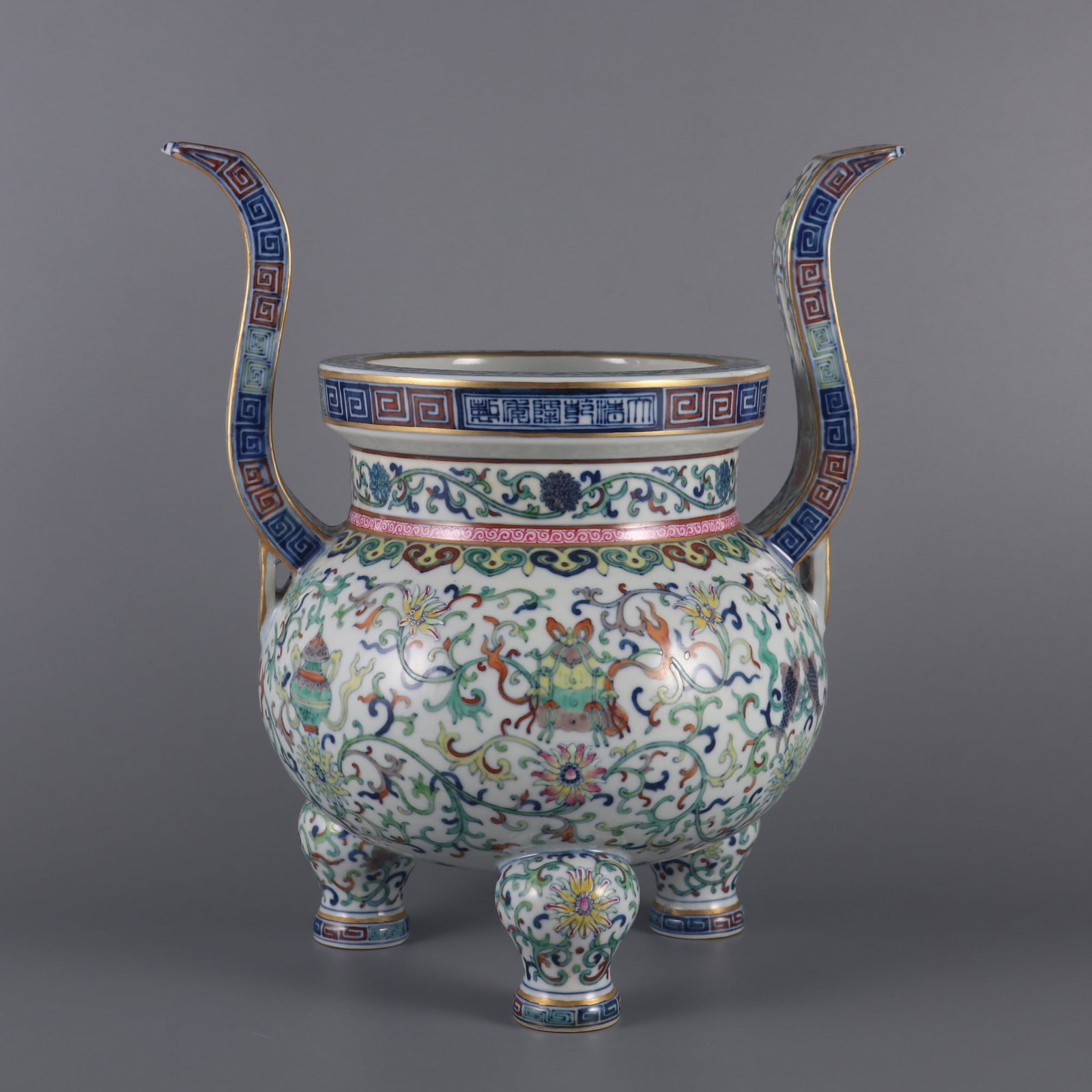 A Rare Doucai Painted Gold Lotus and Eight Treasures Pattern Double-Ears and Tripod Censer: A Rare Doucai Painted Gold Lotus and Eight Treasures Pattern Double-Ears and Tripod Censer,Qing Dynasty, China,Qianlong Six-character Mark,Size:12.2inx9.1inx6.5in斗彩描金ಶ