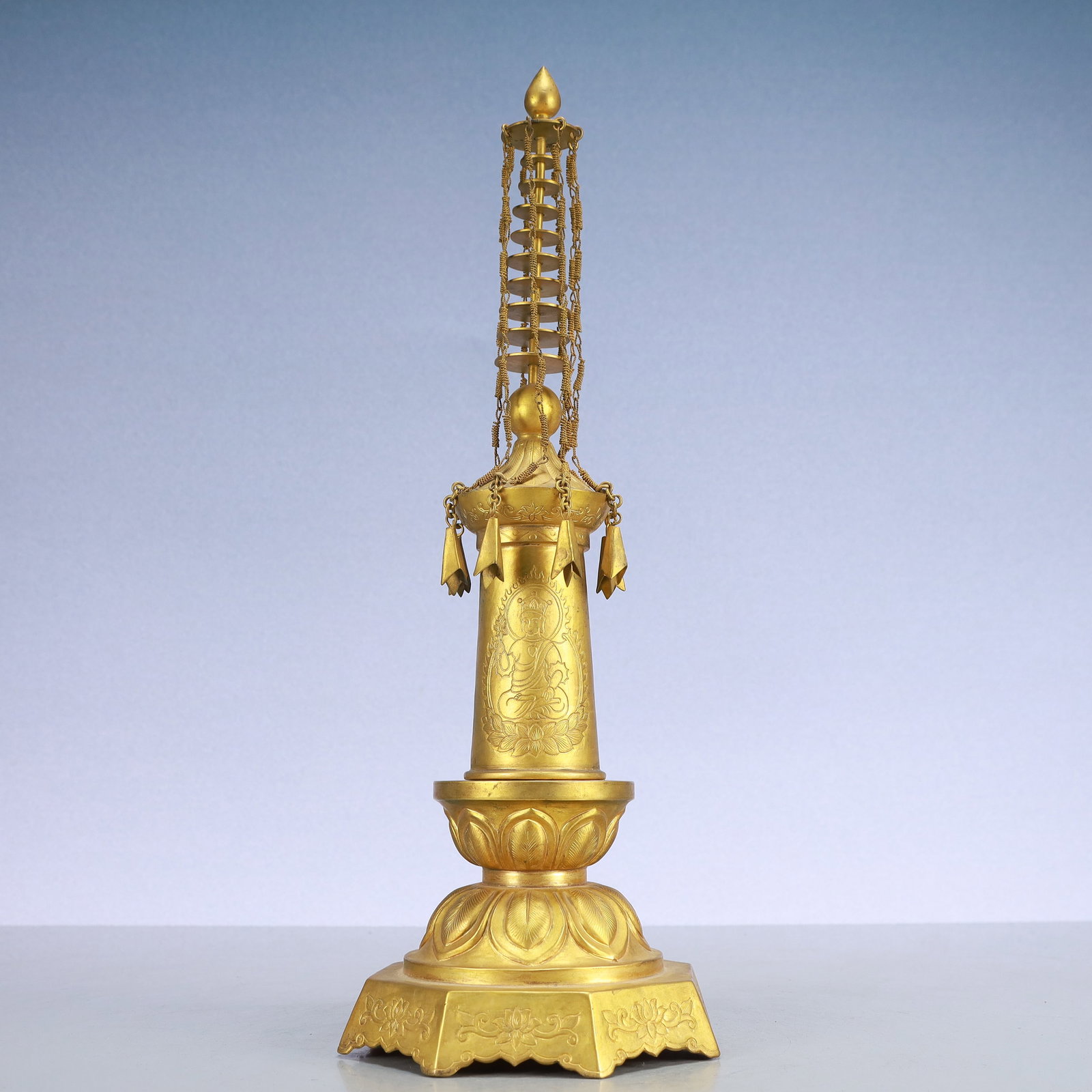 A Exquisite Gilt Bronze Buddha statue Pattern Pagoda: A Exquisite Gilt Bronze Buddha statue Pattern Pagoda Qing Dynasty, China Size:5.5inx15.4in Weight:1150g铜鎏金佛像纹佛塔 中国清代