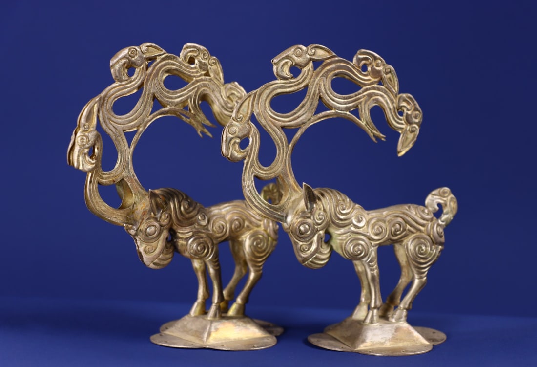 A Pair of Exquisite Silver Auspicious Beast Ornaments: A Pair of Exquisite Silver Auspicious Beast Ornaments,Qing Dynasty,China,Size:5.1inx7.1in,Total