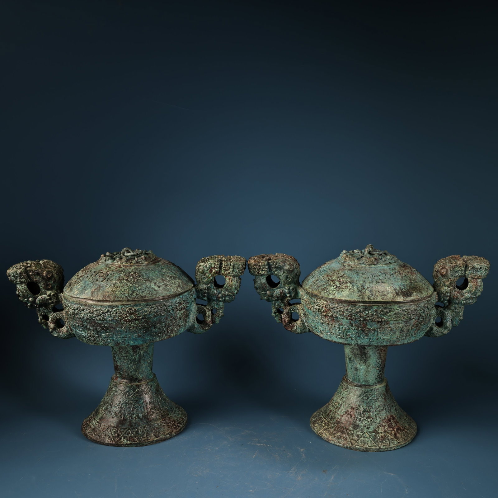 A Pair of Archaic Bronze Double-Ears Censers,With Inscription: A Pair of Archaic Bronze Double-Ears Censers,With Inscription,Qing Dynasty,China,Size:8.7inx11.8in,Total