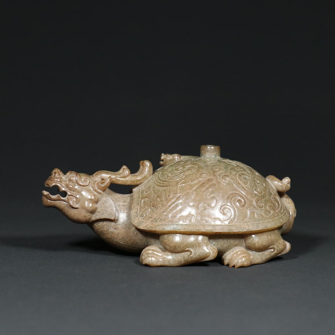 An Exquisite White Jade Dragon and Phoenix Pattern Dragon Turtle Ornament: An Exquisite White Jade Dragon and Phoenix Pattern Dragon Turtle Ornament,Han Dynasty,China,Size:5.8inx3.8inx2.6in,Weight:932.7g白玉龙凤纹龙龟摆件