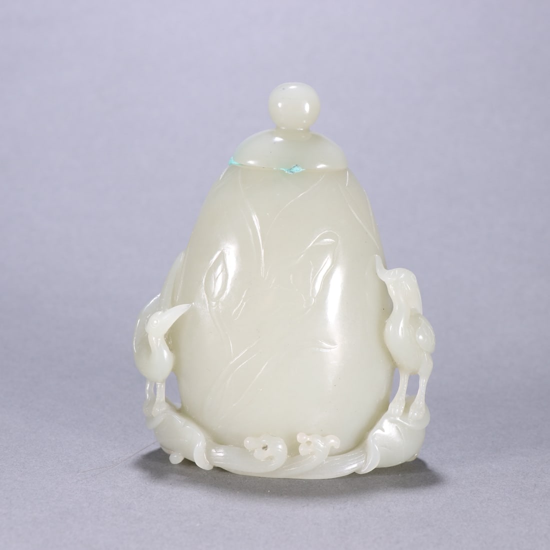 An Exquisite White Jade Lotus and Crane Pattern Vase with Cover: An Exquisite White Jade Lotus and Crane Pattern Vase with Cover,Qing Dynasty,China,Size:2.8inx3.6in,Weight:141.1g白玉莲花鹤纹盖瓶,中国଀